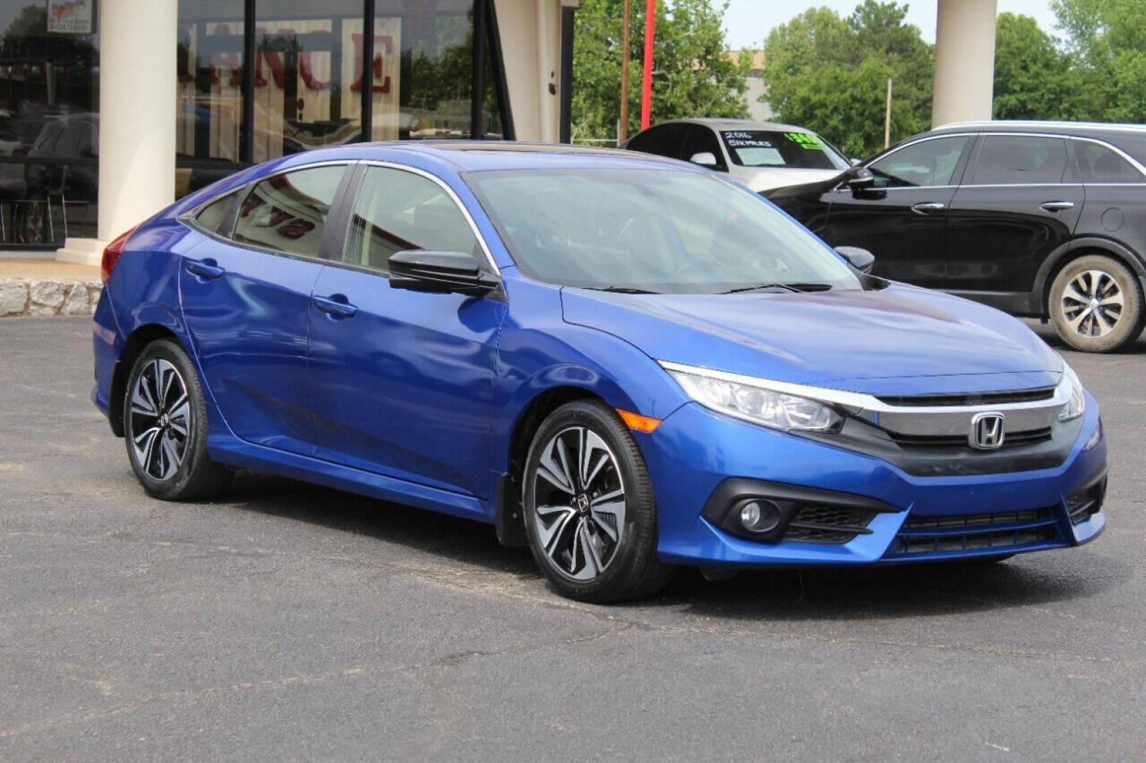 2018 Blue Honda Civic EX-T Sedan CVT (JHMFC1F3XJX) with an 1.5L L4 DOHC 16V TURBO engine, CVT transmission, located at 4301 NW 39th , Oklahoma City, OK, 73112, (405) 949-5600, 35.512135, -97.598671 - NO DRIVERS LICENCE NO-FULL COVERAGE INSURANCE-NO CREDIT CHECK. COME ON OVER TO SUPERSPORTS AND TAKE A LOOK AND TEST DRIVE. PLEASE GIVE US A CALL AT (405) 949-5600. NO LICENSIA DE MANEJAR- NO SEGURO DE COBERTURA TOTAL- NO VERIFICACCION DE CREDITO. POR FAVOR VENGAN A SUPERSPORTS, ECHE UN - Photo#2
