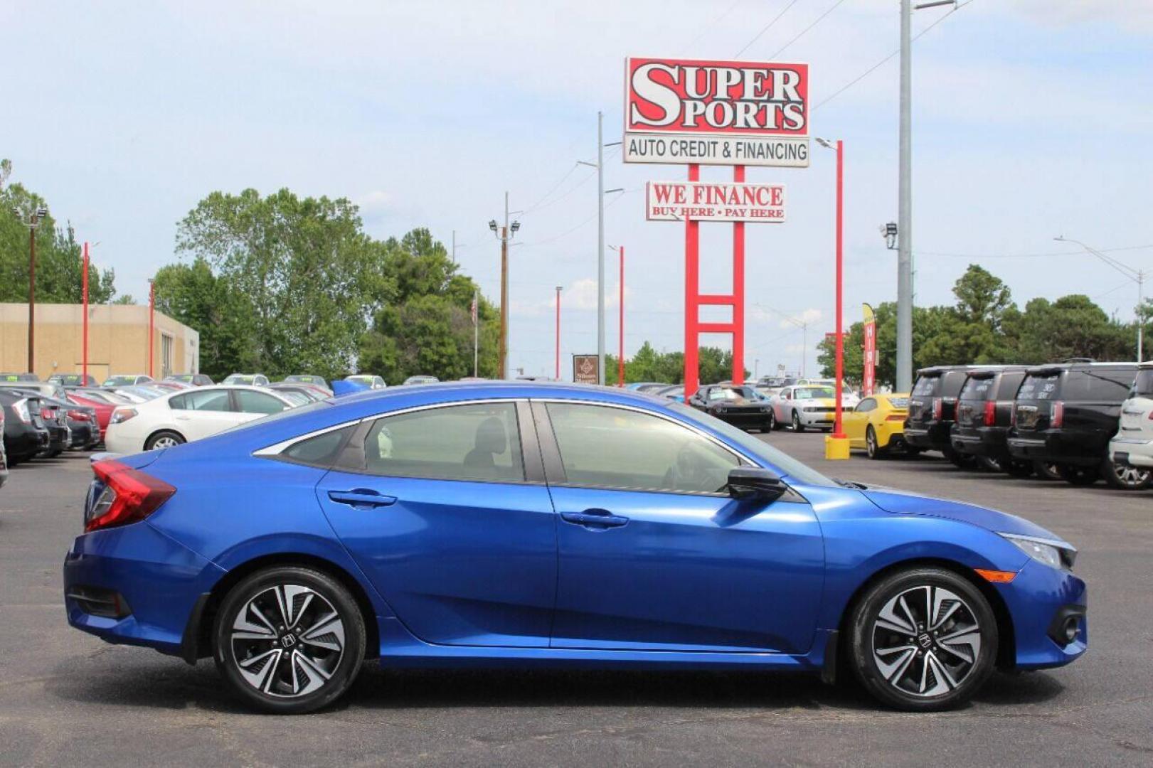 2018 Blue Honda Civic EX-T Sedan CVT (JHMFC1F3XJX) with an 1.5L L4 DOHC 16V TURBO engine, CVT transmission, located at 4301 NW 39th , Oklahoma City, OK, 73112, (405) 949-5600, 35.512135, -97.598671 - NO DRIVERS LICENCE NO-FULL COVERAGE INSURANCE-NO CREDIT CHECK. COME ON OVER TO SUPERSPORTS AND TAKE A LOOK AND TEST DRIVE. PLEASE GIVE US A CALL AT (405) 949-5600. NO LICENSIA DE MANEJAR- NO SEGURO DE COBERTURA TOTAL- NO VERIFICACCION DE CREDITO. POR FAVOR VENGAN A SUPERSPORTS, ECHE UN - Photo#3