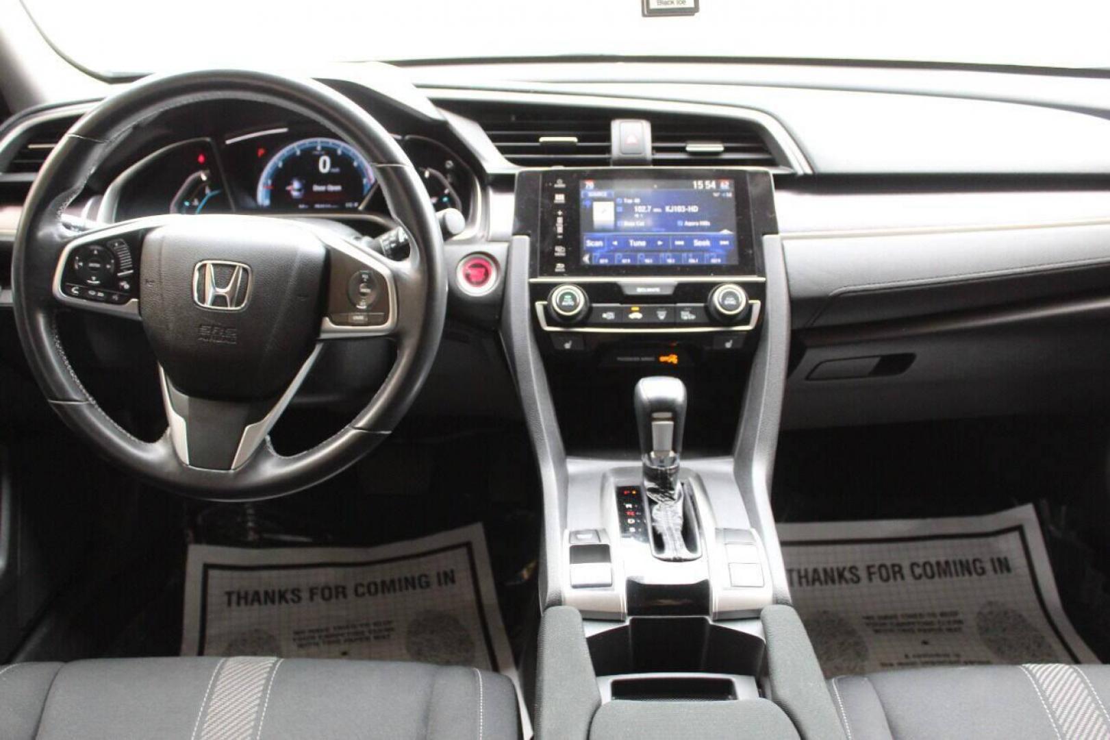 2018 Blue Honda Civic EX-T Sedan CVT (JHMFC1F3XJX) with an 1.5L L4 DOHC 16V TURBO engine, CVT transmission, located at 4301 NW 39th , Oklahoma City, OK, 73112, (405) 949-5600, 35.512135, -97.598671 - NO DRIVERS LICENCE NO-FULL COVERAGE INSURANCE-NO CREDIT CHECK. COME ON OVER TO SUPERSPORTS AND TAKE A LOOK AND TEST DRIVE. PLEASE GIVE US A CALL AT (405) 949-5600. NO LICENSIA DE MANEJAR- NO SEGURO DE COBERTURA TOTAL- NO VERIFICACCION DE CREDITO. POR FAVOR VENGAN A SUPERSPORTS, ECHE UN - Photo#18