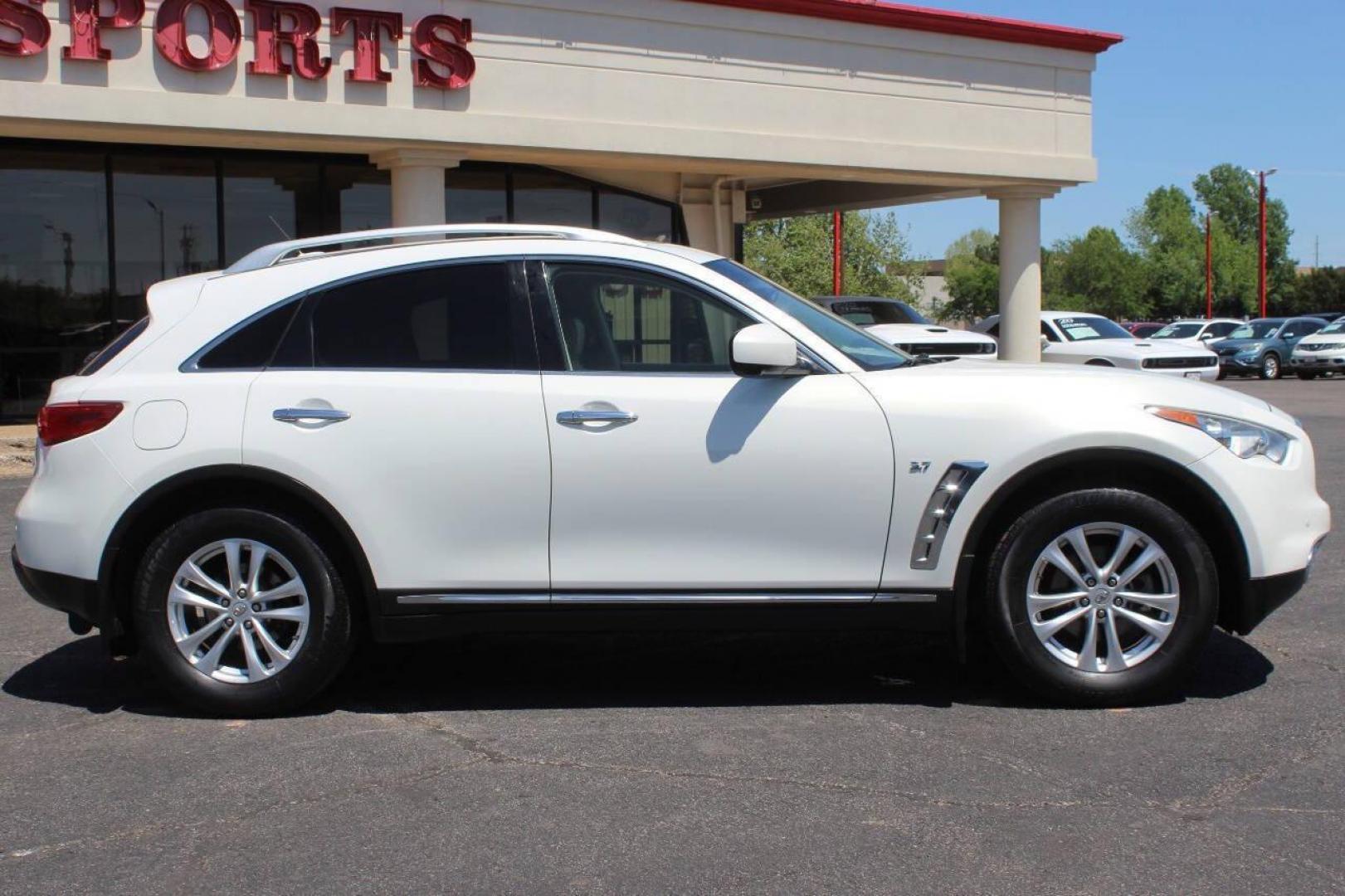 2015 White Infiniti QX70 Base (JN8CS1MU7FM) with an 3.7L V6 DOHC 24V engine, 7-Speed Automatic transmission, located at 4301 NW 39th , Oklahoma City, OK, 73112, (405) 949-5600, 35.512135, -97.598671 - NO DRIVERS LICENCE NO-FULL COVERAGE INSURANCE-NO CREDIT CHECK. COME ON OVER TO SUPERSPORTS AND TAKE A LOOK AND TEST DRIVE. PLEASE GIVE US A CALL AT (405) 949-5600. NO LICENSIA DE MANEJAR- NO SEGURO DE COBERTURA TOTAL- NO VERIFICACCION DE CREDITO. POR FAVOR VENGAN A SUPERSPORTS, ECHE UN - Photo#3