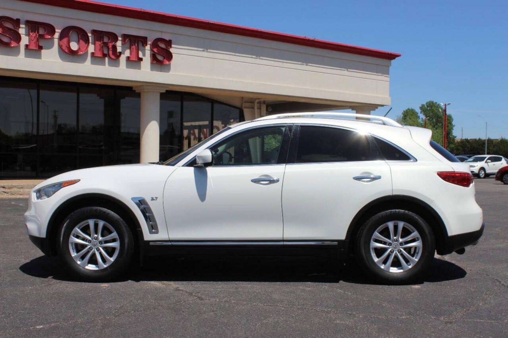 2015 White Infiniti QX70 Base (JN8CS1MU7FM) with an 3.7L V6 DOHC 24V engine, 7-Speed Automatic transmission, located at 4301 NW 39th , Oklahoma City, OK, 73112, (405) 949-5600, 35.512135, -97.598671 - NO DRIVERS LICENCE NO-FULL COVERAGE INSURANCE-NO CREDIT CHECK. COME ON OVER TO SUPERSPORTS AND TAKE A LOOK AND TEST DRIVE. PLEASE GIVE US A CALL AT (405) 949-5600. NO LICENSIA DE MANEJAR- NO SEGURO DE COBERTURA TOTAL- NO VERIFICACCION DE CREDITO. POR FAVOR VENGAN A SUPERSPORTS, ECHE UN - Photo#6