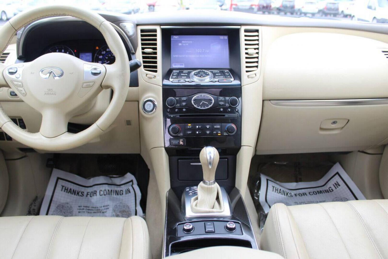 2015 White Infiniti QX70 Base (JN8CS1MU7FM) with an 3.7L V6 DOHC 24V engine, 7-Speed Automatic transmission, located at 4301 NW 39th , Oklahoma City, OK, 73112, (405) 949-5600, 35.512135, -97.598671 - NO DRIVERS LICENCE NO-FULL COVERAGE INSURANCE-NO CREDIT CHECK. COME ON OVER TO SUPERSPORTS AND TAKE A LOOK AND TEST DRIVE. PLEASE GIVE US A CALL AT (405) 949-5600. NO LICENSIA DE MANEJAR- NO SEGURO DE COBERTURA TOTAL- NO VERIFICACCION DE CREDITO. POR FAVOR VENGAN A SUPERSPORTS, ECHE UN - Photo#19