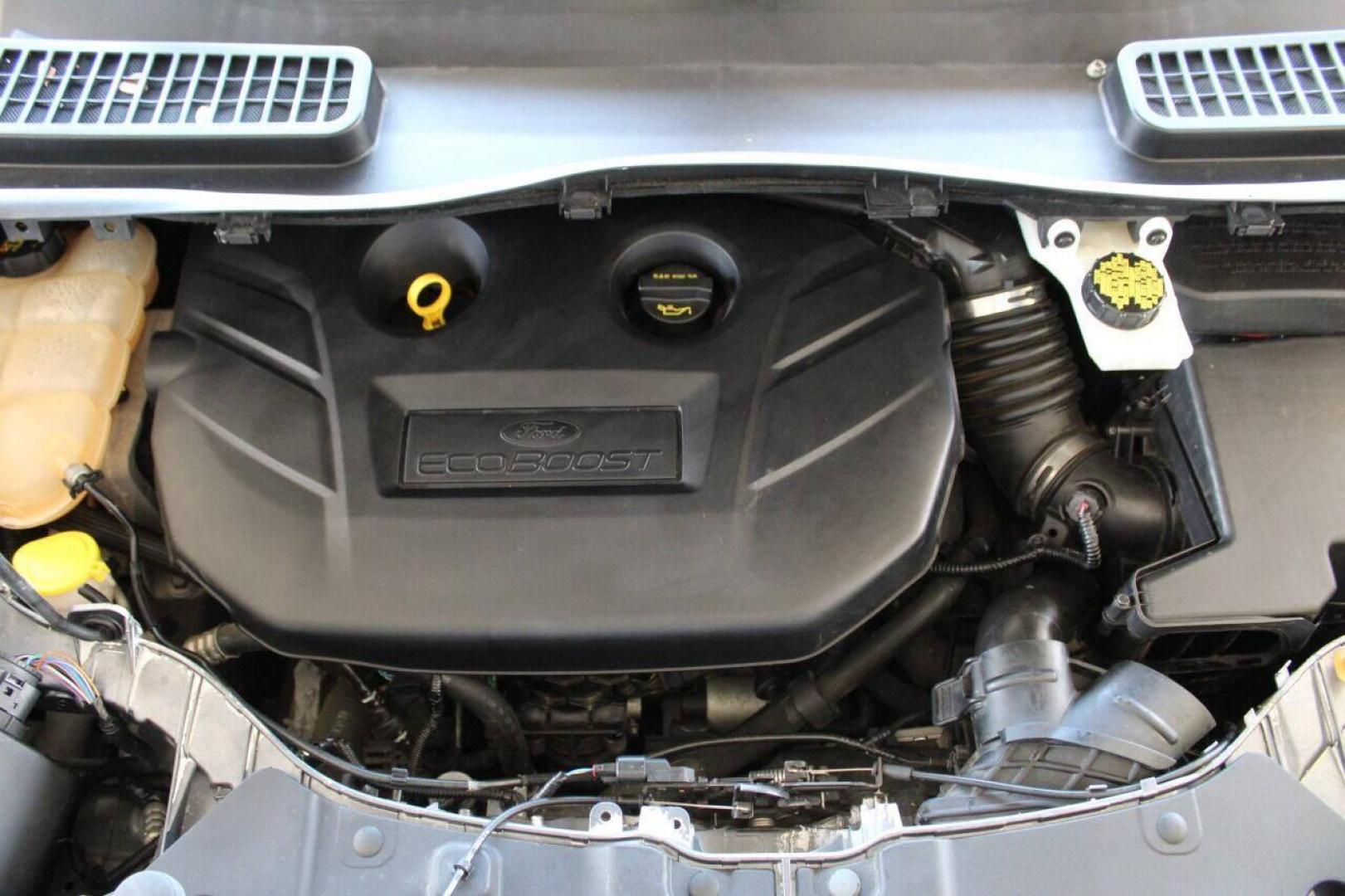 2015 Gray Ford Escape Titanium FWD (1FMCU0J97FU) with an 2.0L L4 DOHC 16V engine, 6-Speed Automatic transmission, located at 4301 NW 39th , Oklahoma City, OK, 73112, (405) 949-5600, 35.512135, -97.598671 - NO DRIVERS LICENCE NO-FULL COVERAGE INSURANCE-NO CREDIT CHECK. COME ON OVER TO SUPERSPORTS AND TAKE A LOOK AND TEST DRIVE PLEASE GIVE US A CALL AT (405) 949-5600. NO LICENSIA DE MANEJAR- NO SEGURO DE COBERTURA TOTAL- NO VERIFICACCION DE CREDITO. POR FAVOR VENGAN A SUPERSPORTS, ECHE UN V - Photo#7
