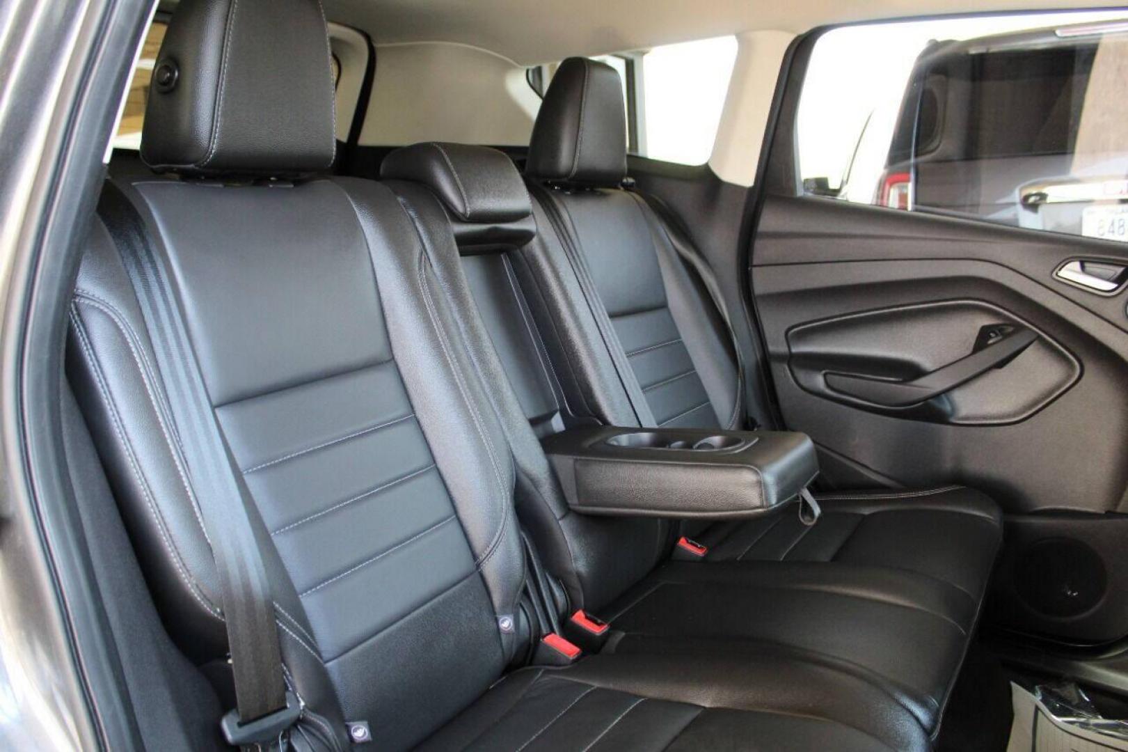2015 Gray Ford Escape Titanium FWD (1FMCU0J97FU) with an 2.0L L4 DOHC 16V engine, 6-Speed Automatic transmission, located at 4301 NW 39th , Oklahoma City, OK, 73112, (405) 949-5600, 35.512135, -97.598671 - NO DRIVERS LICENCE NO-FULL COVERAGE INSURANCE-NO CREDIT CHECK. COME ON OVER TO SUPERSPORTS AND TAKE A LOOK AND TEST DRIVE PLEASE GIVE US A CALL AT (405) 949-5600. NO LICENSIA DE MANEJAR- NO SEGURO DE COBERTURA TOTAL- NO VERIFICACCION DE CREDITO. POR FAVOR VENGAN A SUPERSPORTS, ECHE UN V - Photo#11