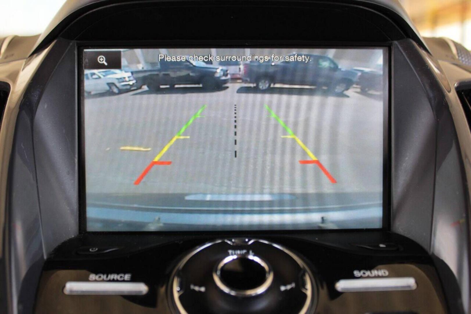 2015 Gray Ford Escape Titanium FWD (1FMCU0J97FU) with an 2.0L L4 DOHC 16V engine, 6-Speed Automatic transmission, located at 4301 NW 39th , Oklahoma City, OK, 73112, (405) 949-5600, 35.512135, -97.598671 - NO DRIVERS LICENCE NO-FULL COVERAGE INSURANCE-NO CREDIT CHECK. COME ON OVER TO SUPERSPORTS AND TAKE A LOOK AND TEST DRIVE PLEASE GIVE US A CALL AT (405) 949-5600. NO LICENSIA DE MANEJAR- NO SEGURO DE COBERTURA TOTAL- NO VERIFICACCION DE CREDITO. POR FAVOR VENGAN A SUPERSPORTS, ECHE UN V - Photo#18