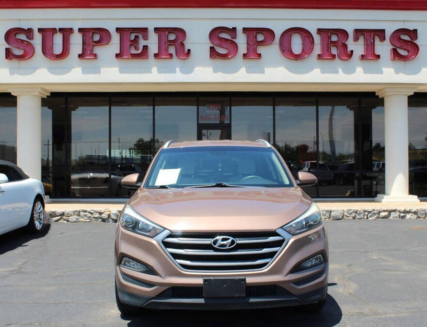 2017 Brown Hyundai Tucson SE w/Preferred Package (KM8J33A44HU) with an 2.0L L4 DOHC 16V engine, 6A transmission, located at 4301 NW 39th , Oklahoma City, OK, 73112, (405) 949-5600, 35.512135, -97.598671 - NO DRIVERS LICENCE NO-FULL COVERAGE INSURANCE-NO CREDIT CHECK. COME ON OVER TO SUPERSPORTS AND TAKE A LOOK AND TEST DRIVE. PLEASE GIVE US A CALL AT (405) 949-5600. NO LICENSIA DE MANEJAR- NO SEGURO DE COBERTURA TOTAL- NO VERIFICACCION DE CREDITO. POR FAVOR VENGAN A SUPERSPORTS, ECHE UN - Photo#12