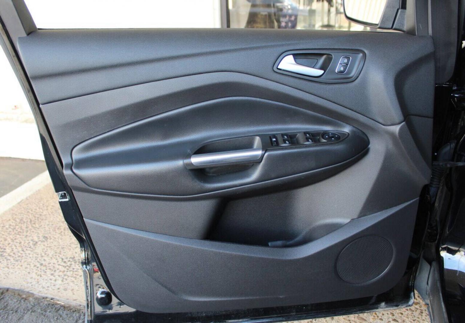 2018 Black Ford Escape SE FWD (1FMCU0GD5JU) with an 1.5L I4 Turbocharger 1.5L I4 engine, Automatic 6-Speed transmission, located at 4301 NW 39th , Oklahoma City, OK, 73112, (405) 949-5600, 35.512135, -97.598671 - NO DRIVERS LICENCE NO - FULL COVERAGE INSURANCE - NO CREDIT CHECK. COME ON OVER TO SUPERSPORTS AND TAKE A LOOK AND TEST DRIVE. PLEASE GIVE US A CALL AT (405) 949-5600. NO LICENCIA DE MANEJAR - NO SEGURO DE COBERTURA TOTAL- NO VERIFICACION DE CREDITO. POR FAVOR VENGAN A SUPERSPORTS, E- Photo#15