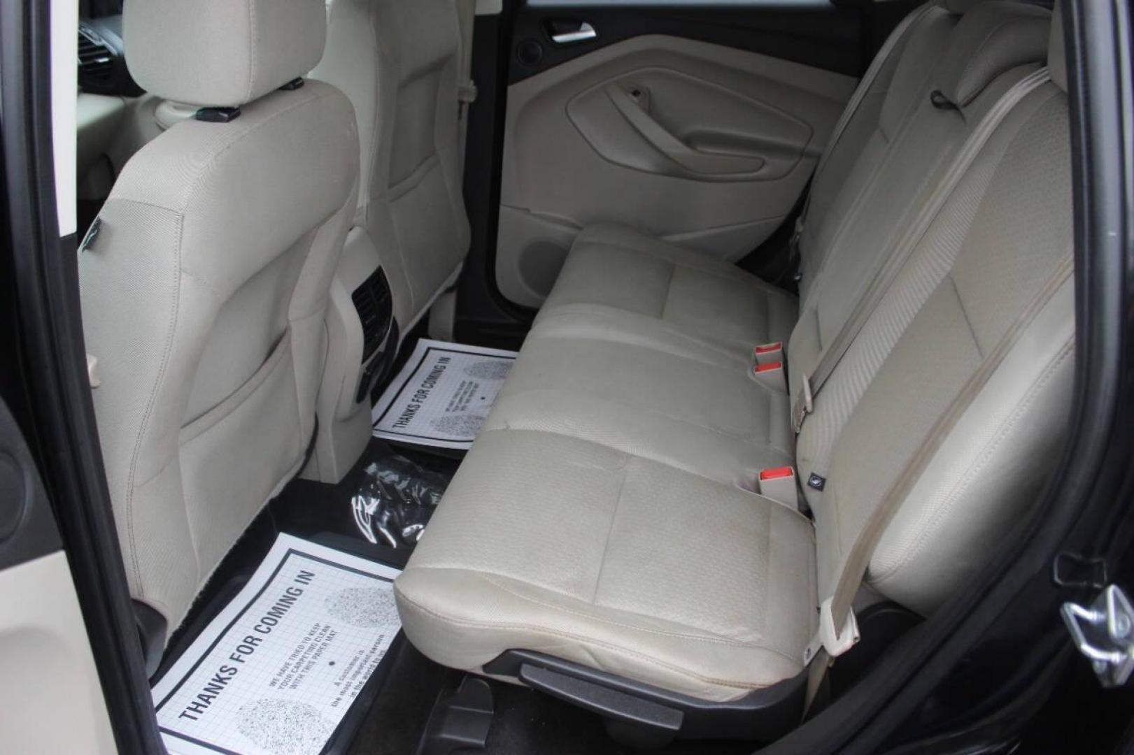 2017 Black Ford Escape SE FWD (1FMCU0GD4HU) with an 1.5L L4 DOHC 16V engine, 6A transmission, located at 4301 NW 39th , Oklahoma City, OK, 73112, (405) 949-5600, 35.512135, -97.598671 - NO DRIVERS LICENCE NO-FULL COVERAGE INSURANCE-NO CREDIT CHECK. COME ON OVER TO SUPERSPORTS AND TAKE A LOOK AND TEST DRIVE. PLEASE GIVE US A CALL AT (405) 949-5600. NO LICENSIA DE MANEJAR- NO SEGURO DE COBERTURA TOTAL- NO VERIFICACCION DE CREDITO. POR FAVOR VENGAN A SUPERSPORTS, - Photo#14