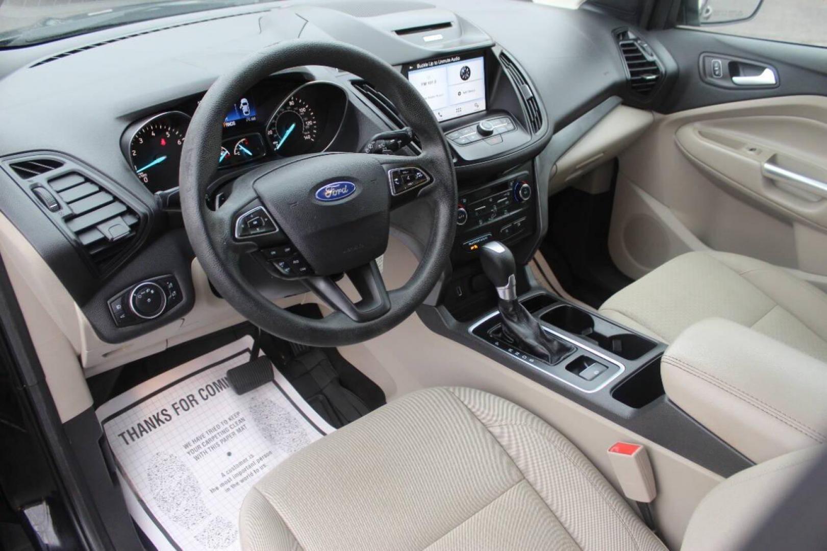 2017 Black Ford Escape SE FWD (1FMCU0GD4HU) with an 1.5L L4 DOHC 16V engine, 6A transmission, located at 4301 NW 39th , Oklahoma City, OK, 73112, (405) 949-5600, 35.512135, -97.598671 - NO DRIVERS LICENCE NO-FULL COVERAGE INSURANCE-NO CREDIT CHECK. COME ON OVER TO SUPERSPORTS AND TAKE A LOOK AND TEST DRIVE. PLEASE GIVE US A CALL AT (405) 949-5600. NO LICENSIA DE MANEJAR- NO SEGURO DE COBERTURA TOTAL- NO VERIFICACCION DE CREDITO. POR FAVOR VENGAN A SUPERSPORTS, - Photo#16
