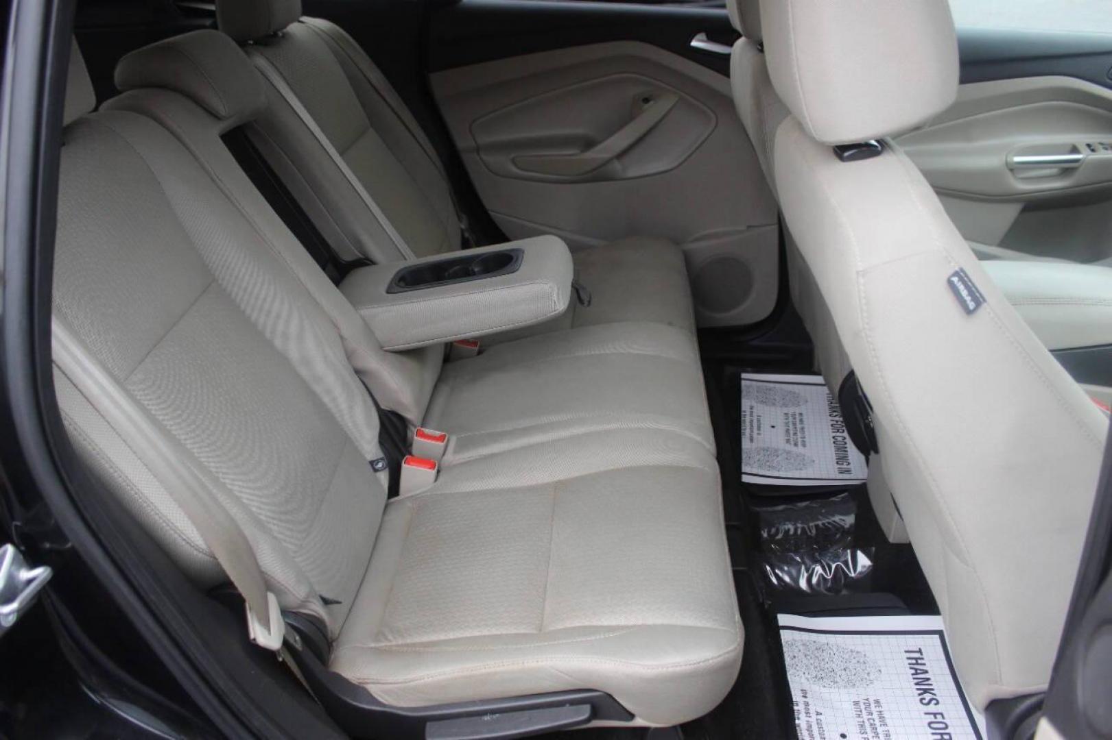 2017 Black Ford Escape SE FWD (1FMCU0GD4HU) with an 1.5L L4 DOHC 16V engine, 6A transmission, located at 4301 NW 39th , Oklahoma City, OK, 73112, (405) 949-5600, 35.512135, -97.598671 - NO DRIVERS LICENCE NO-FULL COVERAGE INSURANCE-NO CREDIT CHECK. COME ON OVER TO SUPERSPORTS AND TAKE A LOOK AND TEST DRIVE. PLEASE GIVE US A CALL AT (405) 949-5600. NO LICENSIA DE MANEJAR- NO SEGURO DE COBERTURA TOTAL- NO VERIFICACCION DE CREDITO. POR FAVOR VENGAN A SUPERSPORTS, - Photo#10