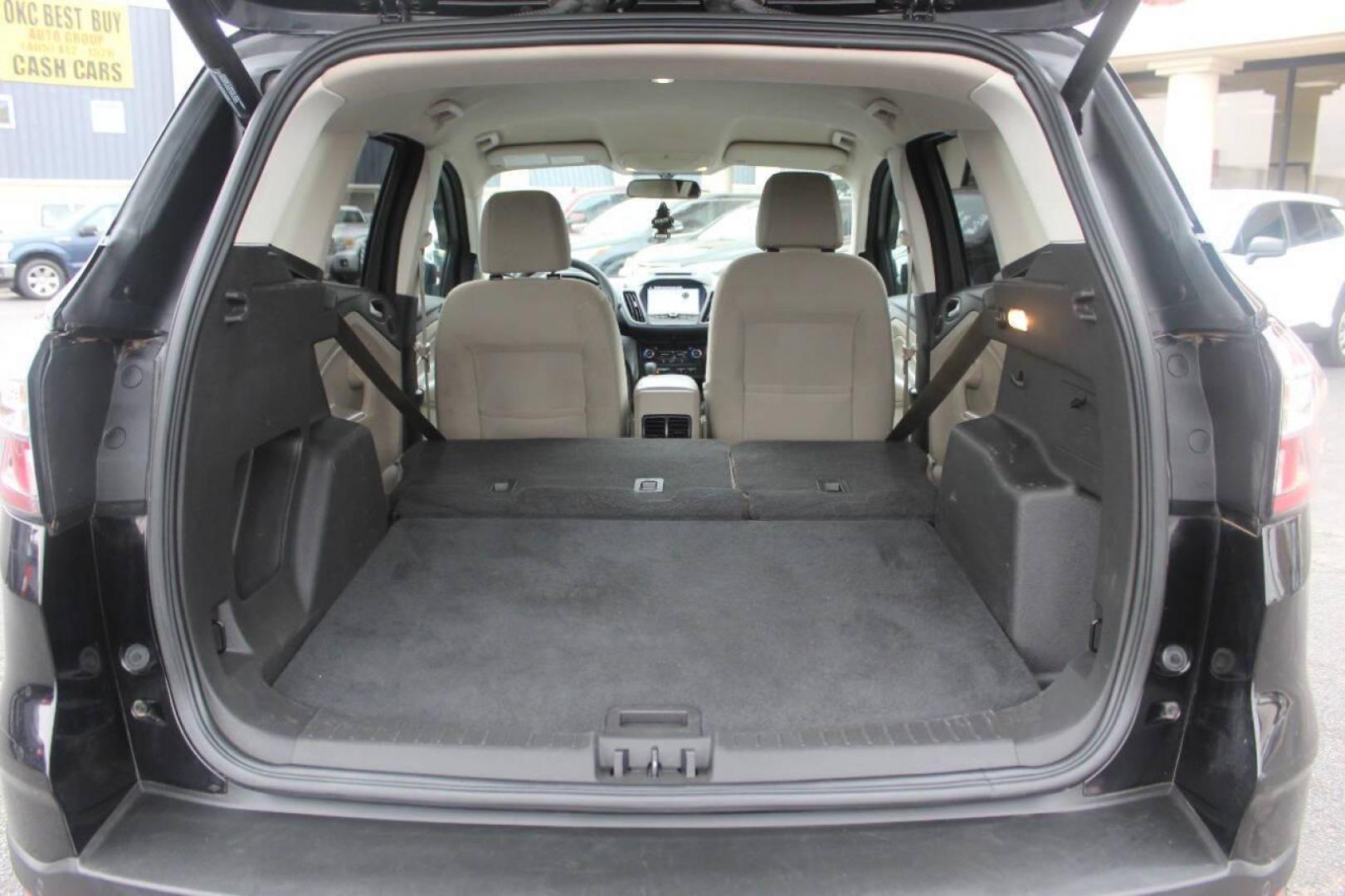 2017 Black Ford Escape SE FWD (1FMCU0GD4HU) with an 1.5L L4 DOHC 16V engine, 6A transmission, located at 4301 NW 39th , Oklahoma City, OK, 73112, (405) 949-5600, 35.512135, -97.598671 - NO DRIVERS LICENCE NO-FULL COVERAGE INSURANCE-NO CREDIT CHECK. COME ON OVER TO SUPERSPORTS AND TAKE A LOOK AND TEST DRIVE. PLEASE GIVE US A CALL AT (405) 949-5600. NO LICENSIA DE MANEJAR- NO SEGURO DE COBERTURA TOTAL- NO VERIFICACCION DE CREDITO. POR FAVOR VENGAN A SUPERSPORTS, - Photo#13