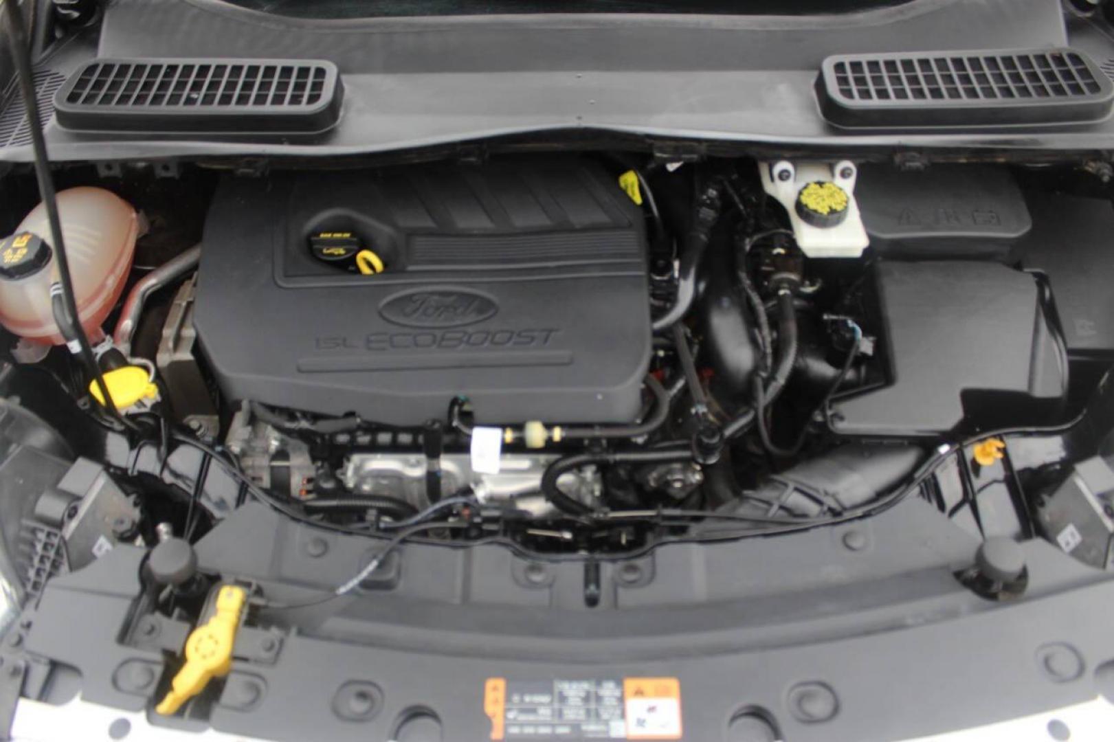 2017 Black Ford Escape SE FWD (1FMCU0GD4HU) with an 1.5L L4 DOHC 16V engine, 6A transmission, located at 4301 NW 39th , Oklahoma City, OK, 73112, (405) 949-5600, 35.512135, -97.598671 - NO DRIVERS LICENCE NO-FULL COVERAGE INSURANCE-NO CREDIT CHECK. COME ON OVER TO SUPERSPORTS AND TAKE A LOOK AND TEST DRIVE. PLEASE GIVE US A CALL AT (405) 949-5600. NO LICENSIA DE MANEJAR- NO SEGURO DE COBERTURA TOTAL- NO VERIFICACCION DE CREDITO. POR FAVOR VENGAN A SUPERSPORTS, - Photo#7