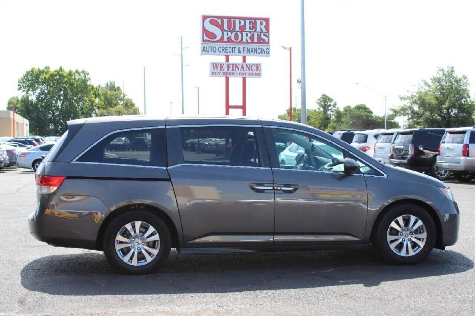 2016 Gray Honda Odyssey EX-L (5FNRL5H64GB) with an 3.5L V6 SOHC 24V engine, 6A transmission, located at 4301 NW 39th , Oklahoma City, OK, 73112, (405) 949-5600, 35.512135, -97.598671 - NO DRIVERS LICENSE NO-FULL COVERAGE INSURANCE-NO CREDIT CHECK. COME ON OVER TO SUPERSPORTS AND TAKE A LOOK AND TEST DRIVE. PLEASE GIVE US A CALL AT (405) 949-5600. NO LICENSIA DE MANEJAR- NO SEGURO DE COBERTURA TOTAL- NO VERIFICACCION DE CREDITO. POR FAVOR VENGAN A SUPERSPORTS, ECHE UN - Photo#3