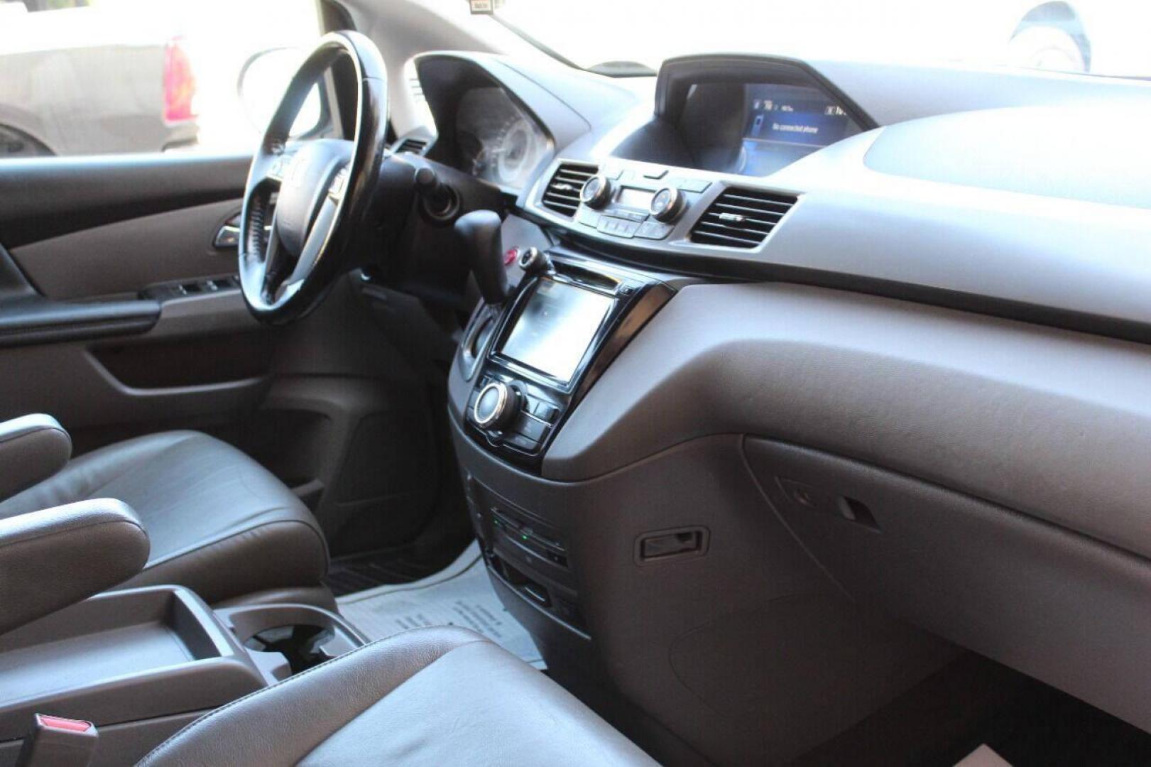 2016 Gray Honda Odyssey EX-L (5FNRL5H64GB) with an 3.5L V6 SOHC 24V engine, 6A transmission, located at 4301 NW 39th , Oklahoma City, OK, 73112, (405) 949-5600, 35.512135, -97.598671 - NO DRIVERS LICENSE NO-FULL COVERAGE INSURANCE-NO CREDIT CHECK. COME ON OVER TO SUPERSPORTS AND TAKE A LOOK AND TEST DRIVE. PLEASE GIVE US A CALL AT (405) 949-5600. NO LICENSIA DE MANEJAR- NO SEGURO DE COBERTURA TOTAL- NO VERIFICACCION DE CREDITO. POR FAVOR VENGAN A SUPERSPORTS, ECHE UN - Photo#8