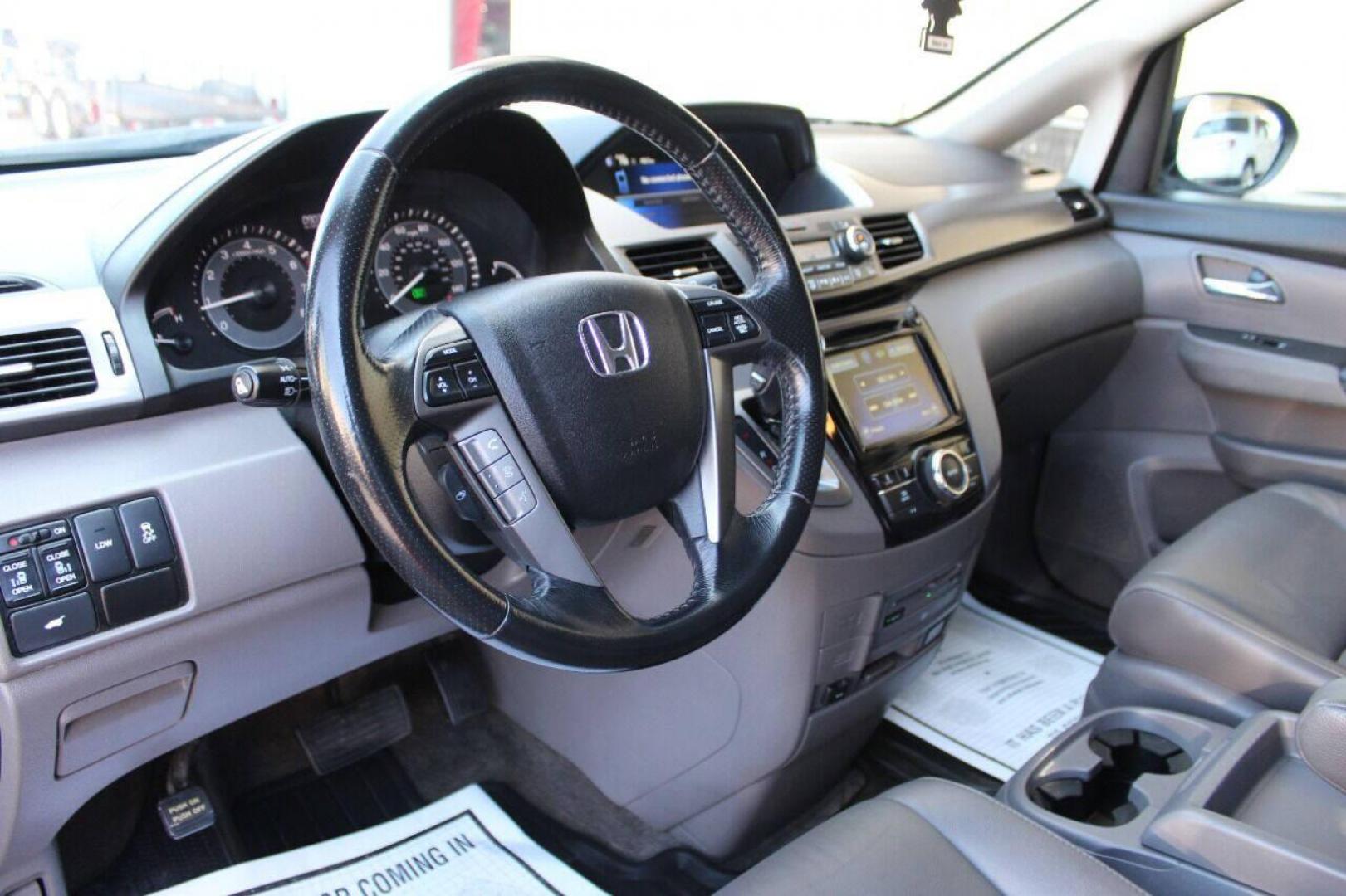 2016 Gray Honda Odyssey EX-L (5FNRL5H64GB) with an 3.5L V6 SOHC 24V engine, 6A transmission, located at 4301 NW 39th , Oklahoma City, OK, 73112, (405) 949-5600, 35.512135, -97.598671 - NO DRIVERS LICENSE NO-FULL COVERAGE INSURANCE-NO CREDIT CHECK. COME ON OVER TO SUPERSPORTS AND TAKE A LOOK AND TEST DRIVE. PLEASE GIVE US A CALL AT (405) 949-5600. NO LICENSIA DE MANEJAR- NO SEGURO DE COBERTURA TOTAL- NO VERIFICACCION DE CREDITO. POR FAVOR VENGAN A SUPERSPORTS, ECHE UN - Photo#15