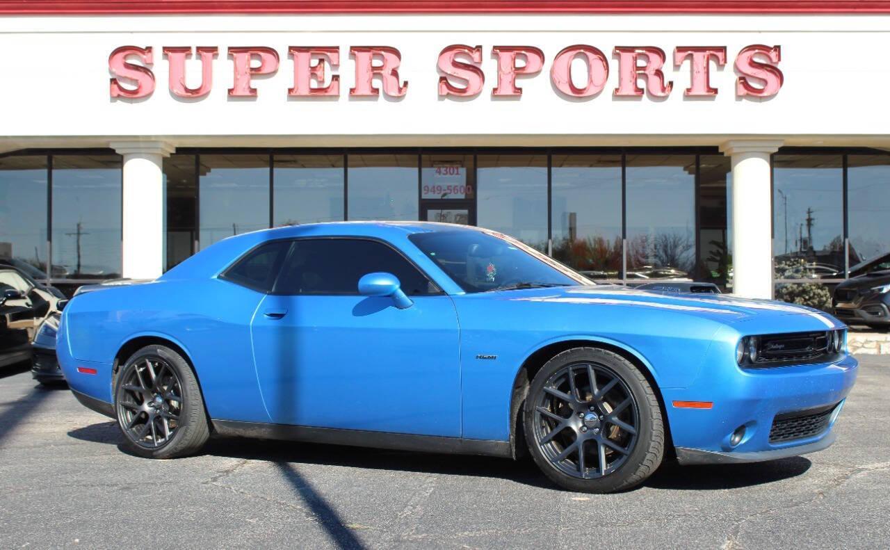2016 Blue Dodge Challenger R/T Plus (2C3CDZBT4GH) with an 5.7L V8 OHV 16V engine, Manual 6-Speed transmission, located at 4301 NW 39th , Oklahoma City, OK, 73112, (405) 949-5600, 35.512135, -97.598671 - NO DRIVERS LICENCE -NO FULL COVERAGE INSURANCE - NO CREDIT CHECK. COME ON OVER TO SUPERSPORTS, TAKE A LOOK AND TEST DRIVE. PLEASE GIVE US A CALL AT (405) 949-5600. NO LICENCIA DE CONDUCIR - NO SEGURO DE COBERTURA TOTAL - NO VERIFICACION DE CREDITO. VISITENOS EN SUPERSPORTS, MIRE N - Photo#0