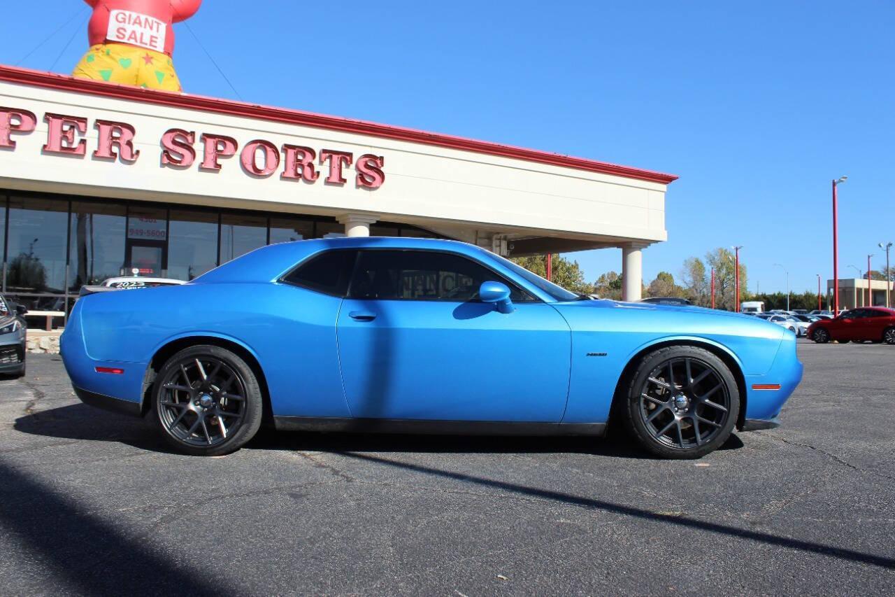 2016 Blue Dodge Challenger R/T Plus (2C3CDZBT4GH) with an 5.7L V8 OHV 16V engine, Manual 6-Speed transmission, located at 4301 NW 39th , Oklahoma City, OK, 73112, (405) 949-5600, 35.512135, -97.598671 - NO DRIVERS LICENCE -NO FULL COVERAGE INSURANCE - NO CREDIT CHECK. COME ON OVER TO SUPERSPORTS, TAKE A LOOK AND TEST DRIVE. PLEASE GIVE US A CALL AT (405) 949-5600. NO LICENCIA DE CONDUCIR - NO SEGURO DE COBERTURA TOTAL - NO VERIFICACION DE CREDITO. VISITENOS EN SUPERSPORTS, MIRE N - Photo#2