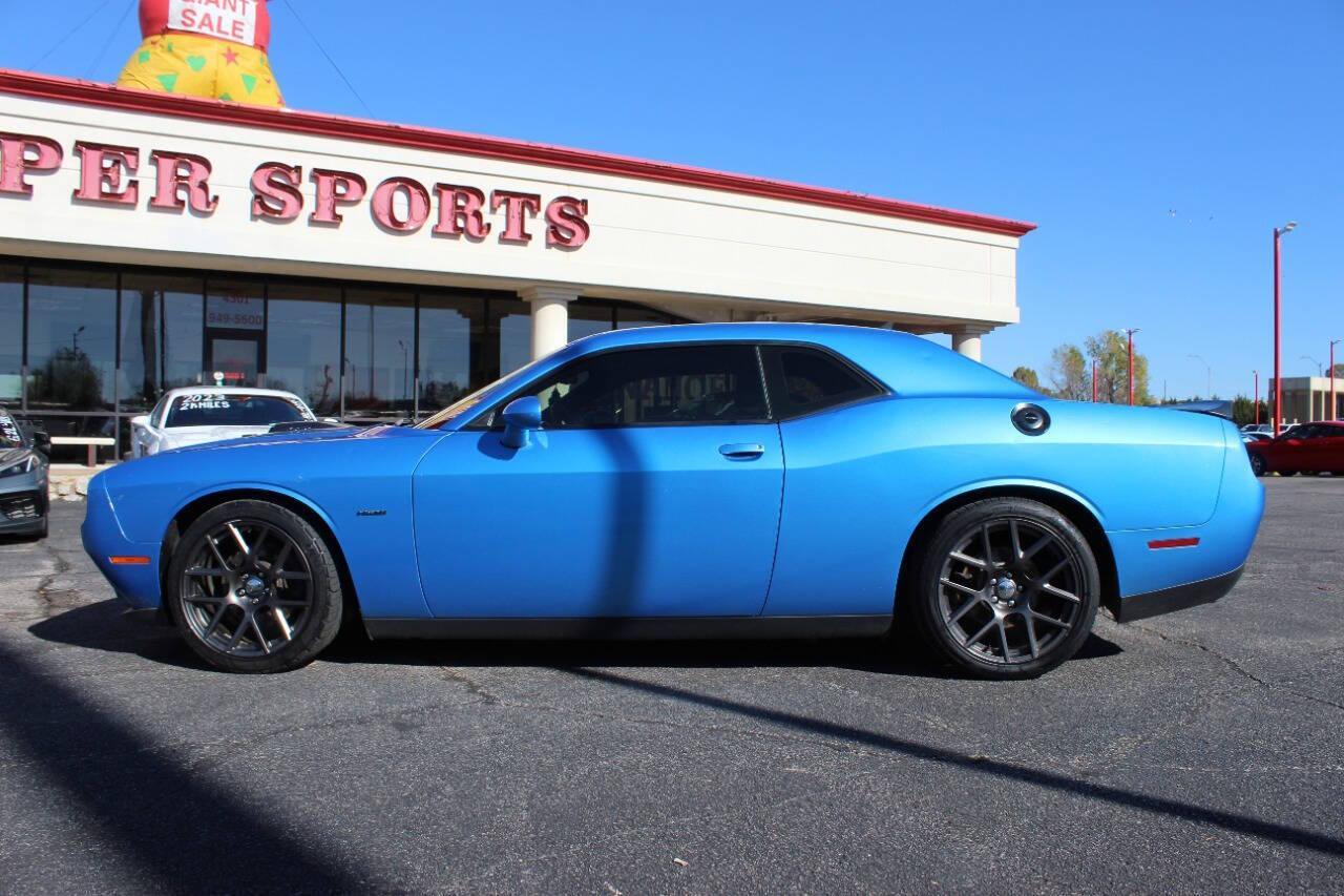 2016 Blue Dodge Challenger R/T Plus (2C3CDZBT4GH) with an 5.7L V8 OHV 16V engine, Manual 6-Speed transmission, located at 4301 NW 39th , Oklahoma City, OK, 73112, (405) 949-5600, 35.512135, -97.598671 - NO DRIVERS LICENCE -NO FULL COVERAGE INSURANCE - NO CREDIT CHECK. COME ON OVER TO SUPERSPORTS, TAKE A LOOK AND TEST DRIVE. PLEASE GIVE US A CALL AT (405) 949-5600. NO LICENCIA DE CONDUCIR - NO SEGURO DE COBERTURA TOTAL - NO VERIFICACION DE CREDITO. VISITENOS EN SUPERSPORTS, MIRE N - Photo#5