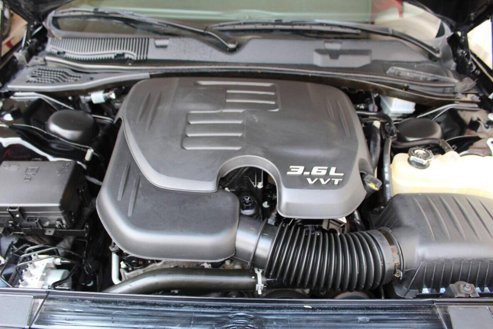 2018 Black Dodge Challenger SXT (2C3CDZAG4JH) with an 3.6L V6 DOHC 24V engine, 8A transmission, located at 4301 NW 39th , Oklahoma City, OK, 73112, (405) 949-5600, 35.512135, -97.598671 - Photo#7