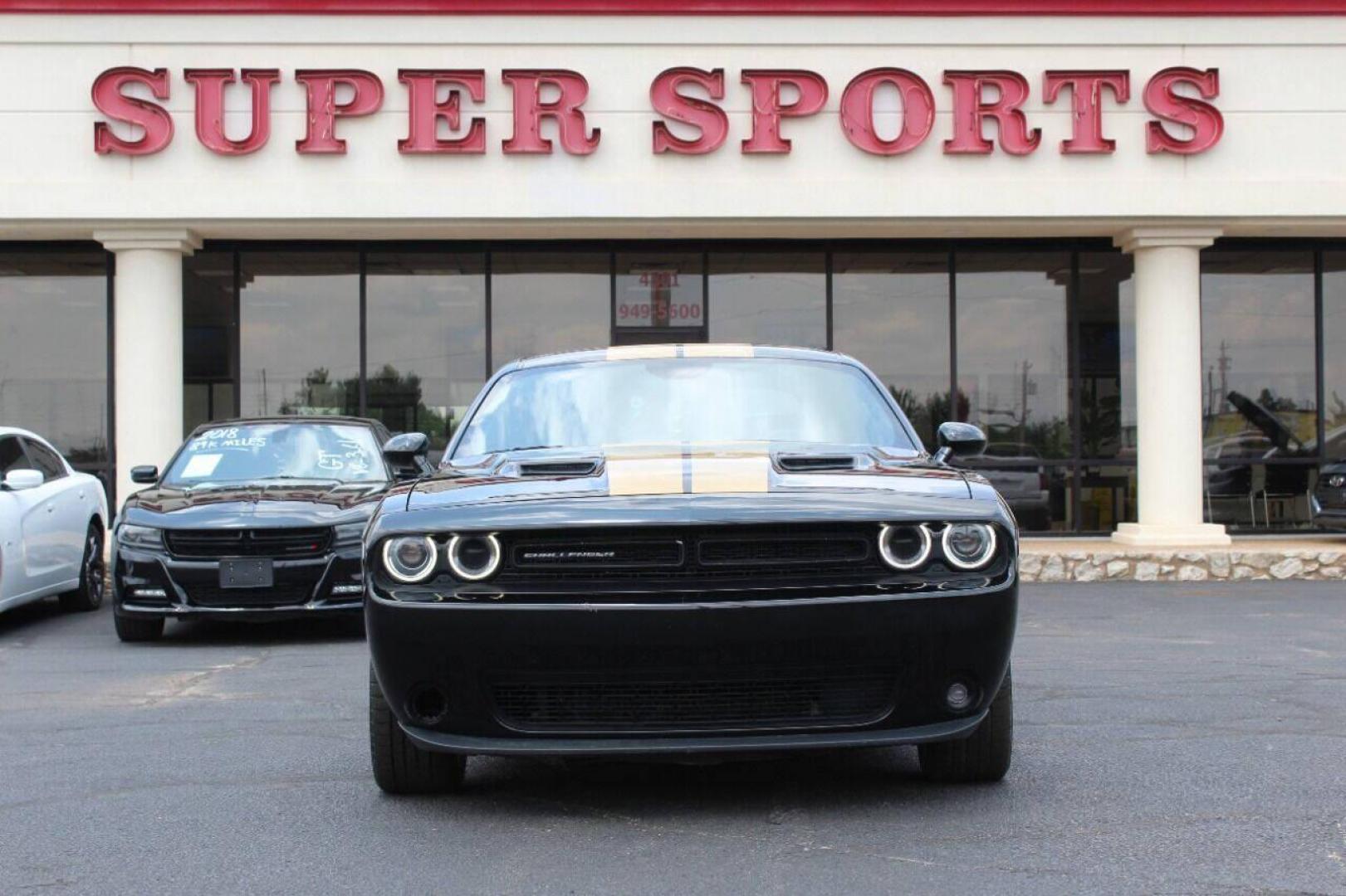 2018 Black Dodge Challenger SXT (2C3CDZAG4JH) with an 3.6L V6 DOHC 24V engine, 8A transmission, located at 4301 NW 39th , Oklahoma City, OK, 73112, (405) 949-5600, 35.512135, -97.598671 - Photo#0