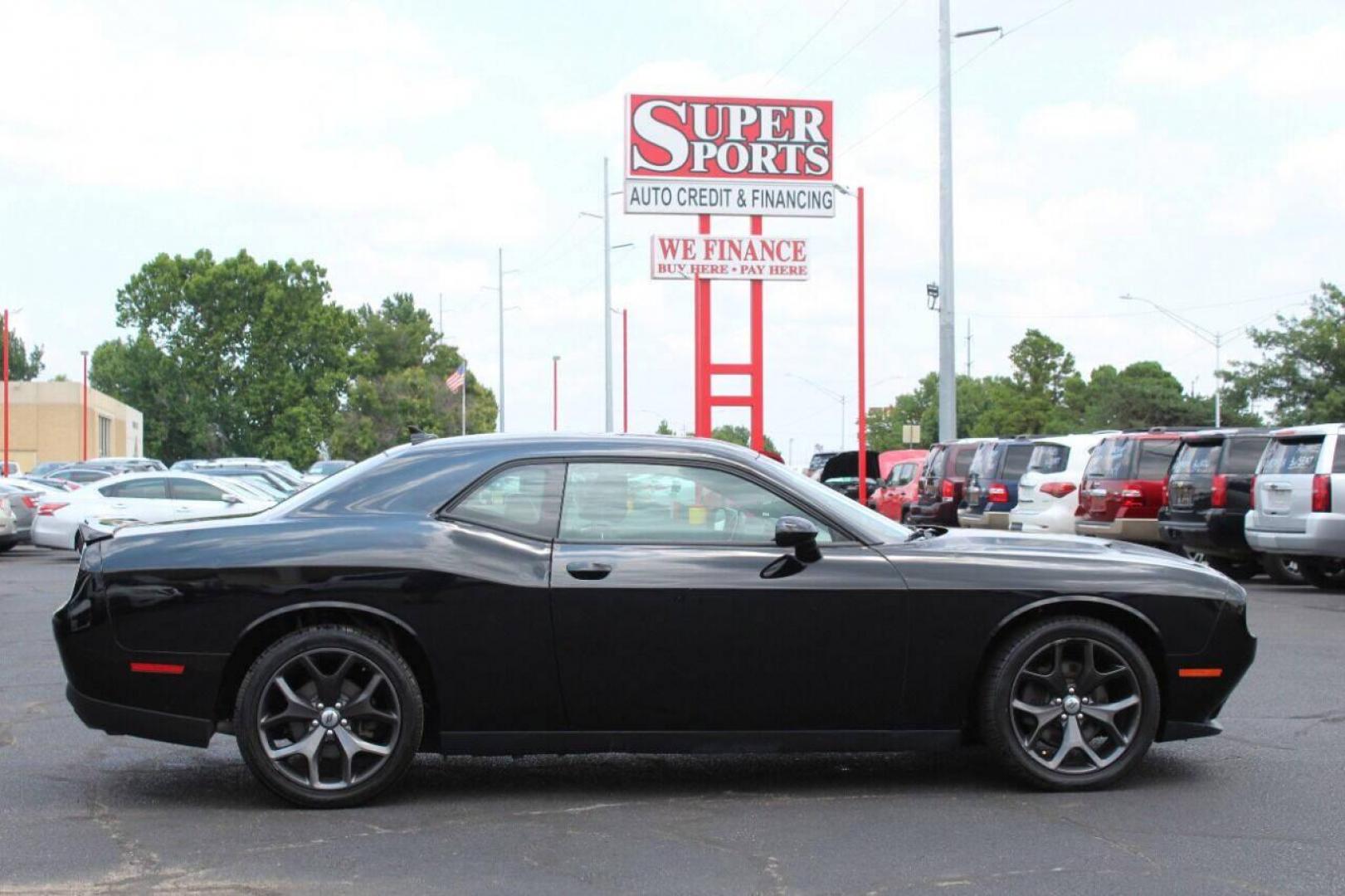 2018 Black Dodge Challenger SXT (2C3CDZAG4JH) with an 3.6L V6 DOHC 24V engine, 8A transmission, located at 4301 NW 39th , Oklahoma City, OK, 73112, (405) 949-5600, 35.512135, -97.598671 - Photo#3