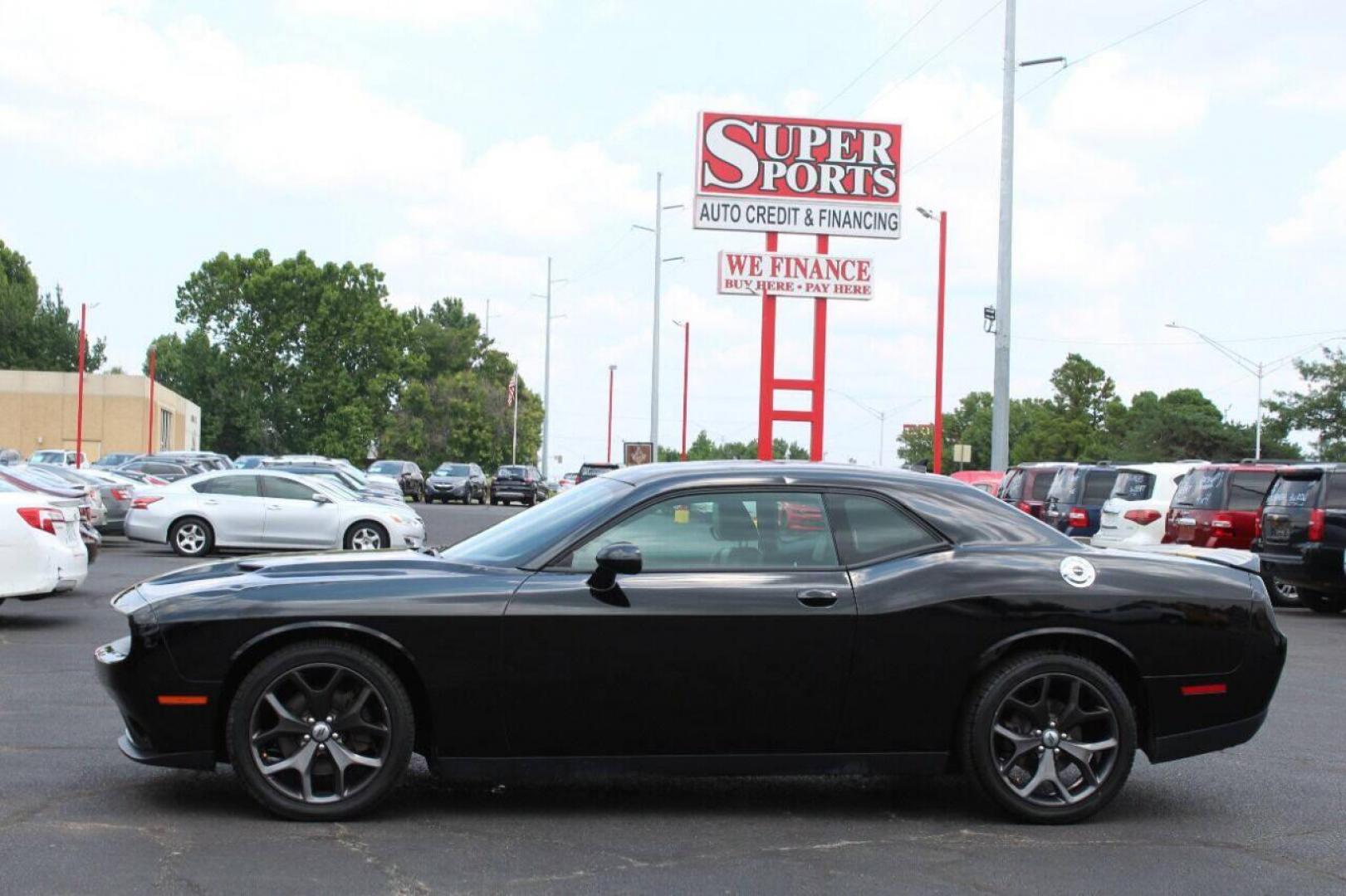 2018 Black Dodge Challenger SXT (2C3CDZAG4JH) with an 3.6L V6 DOHC 24V engine, 8A transmission, located at 4301 NW 39th , Oklahoma City, OK, 73112, (405) 949-5600, 35.512135, -97.598671 - Photo#6
