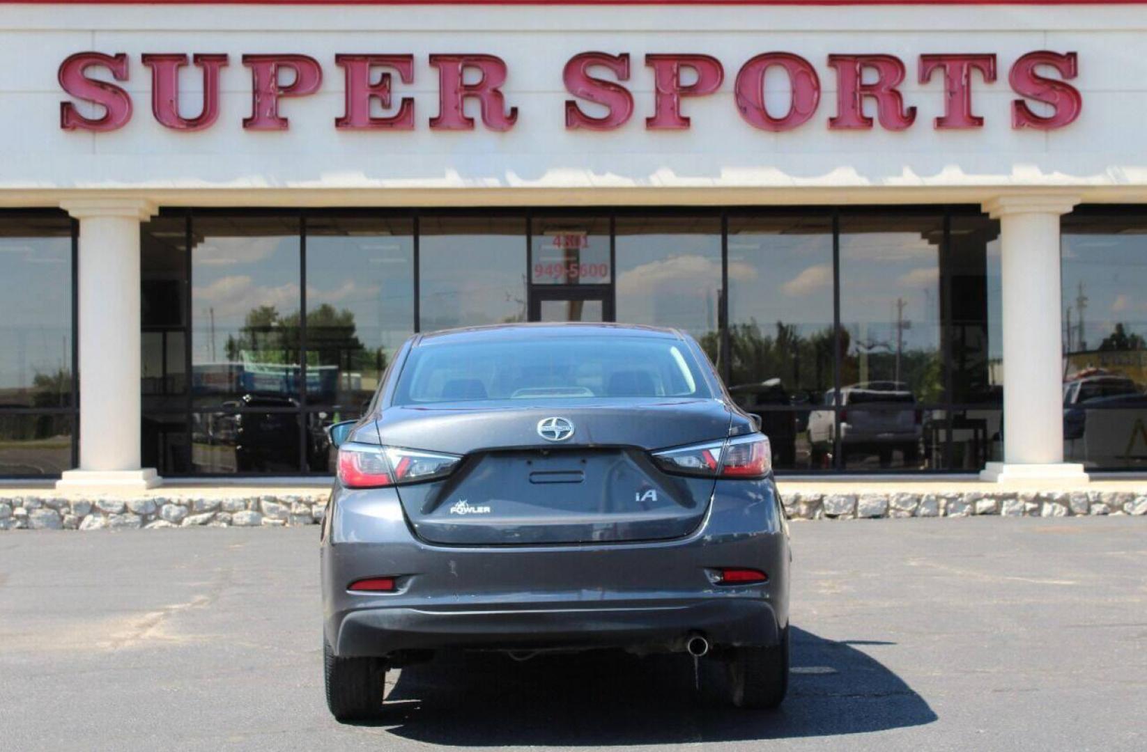 2016 Charcoal Scion iA 6A (3MYDLBZV7GY) with an 1.5L L4 DOHC 16V engine, 6A transmission, located at 4301 NW 39th , Oklahoma City, OK, 73112, (405) 949-5600, 35.512135, -97.598671 - NO DRIVERS LICENCE NO-FULL COVERAGE INSURANCE-NO CREDIT CHECK. COME ON OVER TO SUPERSPORTS AND TAKE A LOOK AND TEST DRIVE. PLEASE GIVE US A CALL AT (405) 949-5600. NO LICENSIA DE MANEJAR- NO SEGURO DE COBERTURA TOTAL- NO VERIFICACCION DE CREDITO. POR FAVOR VENGAN A SUPERSPORTS, ECHE UN - Photo#5