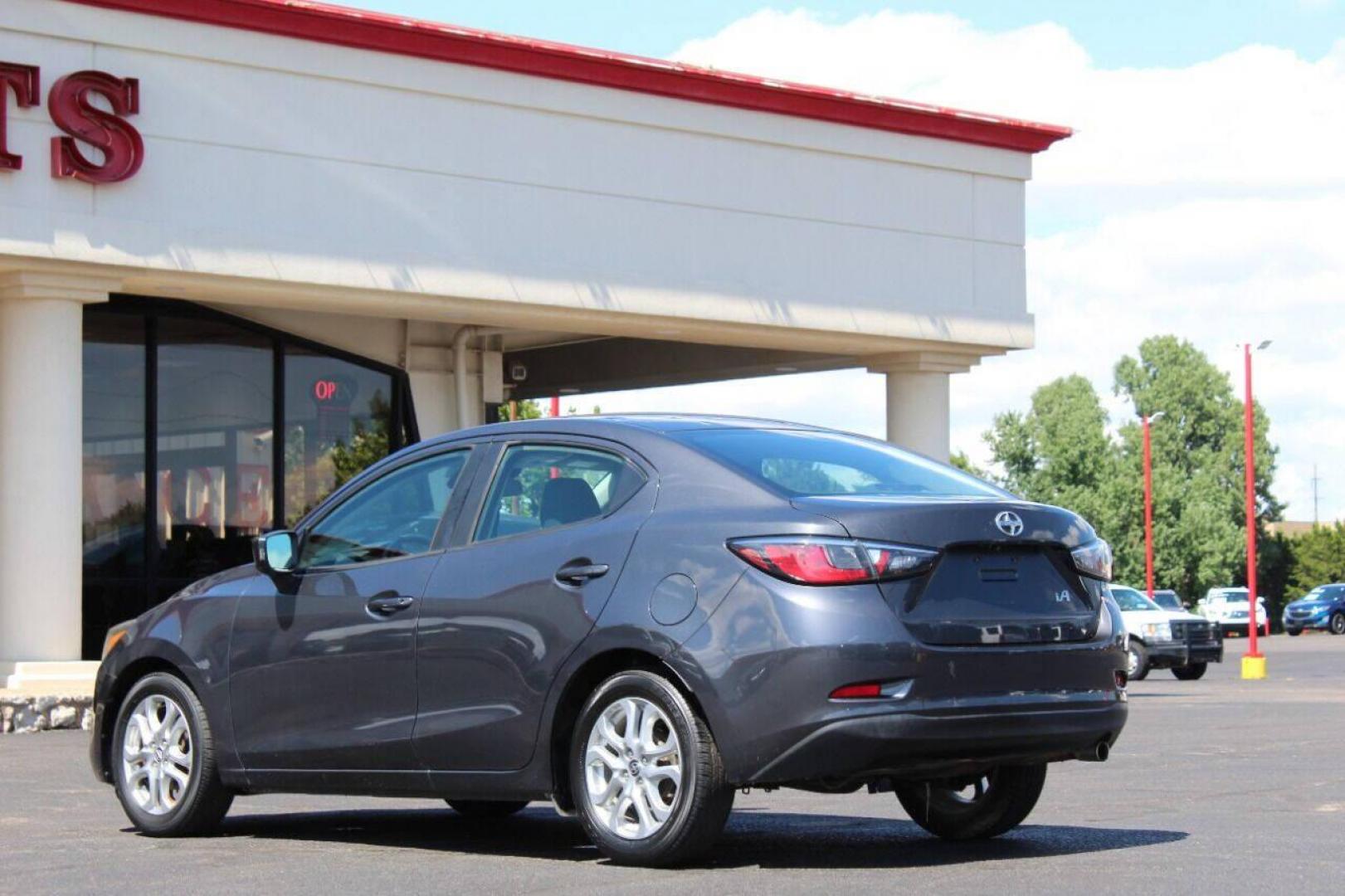 2016 Charcoal Scion iA 6A (3MYDLBZV7GY) with an 1.5L L4 DOHC 16V engine, 6A transmission, located at 4301 NW 39th , Oklahoma City, OK, 73112, (405) 949-5600, 35.512135, -97.598671 - NO DRIVERS LICENCE NO-FULL COVERAGE INSURANCE-NO CREDIT CHECK. COME ON OVER TO SUPERSPORTS AND TAKE A LOOK AND TEST DRIVE. PLEASE GIVE US A CALL AT (405) 949-5600. NO LICENSIA DE MANEJAR- NO SEGURO DE COBERTURA TOTAL- NO VERIFICACCION DE CREDITO. POR FAVOR VENGAN A SUPERSPORTS, ECHE UN - Photo#6