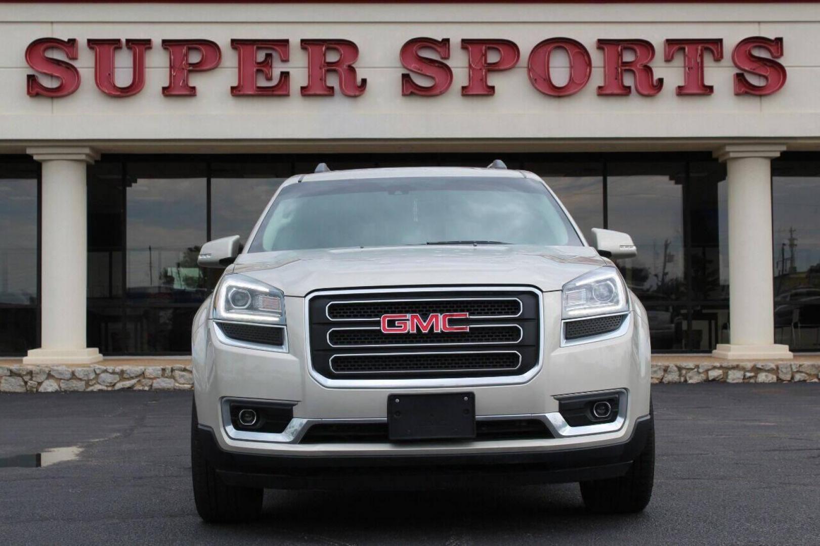 2017 Tan GMC Acadia SLT-2 FWD (1GKKRSKD8HJ) with an 3.6L V6 DOHC 24V engine, 6A transmission, located at 4301 NW 39th , Oklahoma City, OK, 73112, (405) 949-5600, 35.512135, -97.598671 - NO DRIVERS LICENCE NO - FULL COVERAGE INSURANCE - NO CREDIT CHECK. COME ON OVER TO SUPERSPORTS AND TAKE A LOOK AND TEST DRIVE . PLEASE GIVE US A CALL AT (405) 949-5600. NO LICENCIA DE MANEJAR - NO SEGURO DE COBERTURA TOTAL - NO VERIFICACION DE CREDITO. POR FAVOR VENGAN A SUPERSPORTS, EC - Photo#2