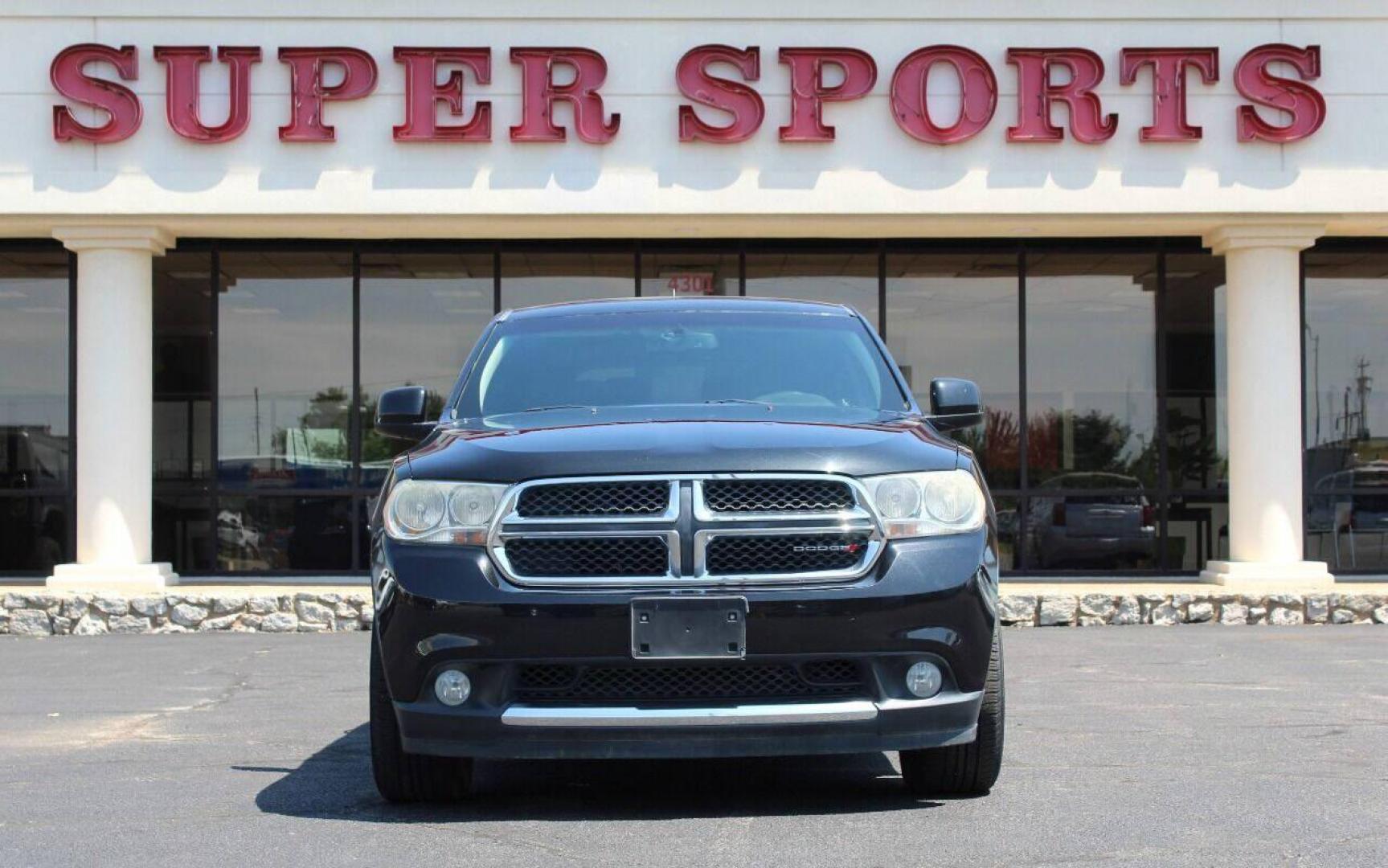 2013 Black Dodge Durango SXT RWD (1C4RDHAG7DC) with an 3.6L V6 DOHC 24V engine, 5-Speed Automatic transmission, located at 4301 NW 39th , Oklahoma City, OK, 73112, (405) 949-5600, 35.512135, -97.598671 - NO DRIVERS LICENCE NO-FULL COVERAGE INSURANCE-NO CREDIT CHECK. COME ON OVER TO SUPERSPORTS AND TAKE A LOOK AND TEST DRIVE PLEASE GIVE US A CALL AT (405) 949-5600. NO LICENSIA DE MANEJAR- NO SEGURO DE COBERTURA TOTAL- NO VERIFICACCION DE CREDITO. POR FAVOR VENGAN A SUPERSPORTS, E - Photo#18