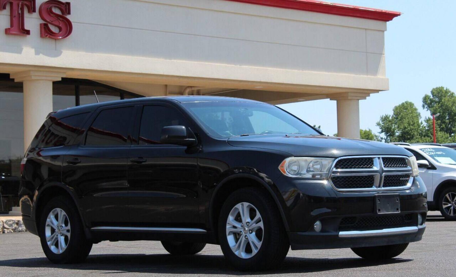 2013 Black Dodge Durango SXT RWD (1C4RDHAG7DC) with an 3.6L V6 DOHC 24V engine, 5-Speed Automatic transmission, located at 4301 NW 39th , Oklahoma City, OK, 73112, (405) 949-5600, 35.512135, -97.598671 - NO DRIVERS LICENCE NO-FULL COVERAGE INSURANCE-NO CREDIT CHECK. COME ON OVER TO SUPERSPORTS AND TAKE A LOOK AND TEST DRIVE PLEASE GIVE US A CALL AT (405) 949-5600. NO LICENSIA DE MANEJAR- NO SEGURO DE COBERTURA TOTAL- NO VERIFICACCION DE CREDITO. POR FAVOR VENGAN A SUPERSPORTS, E - Photo#20
