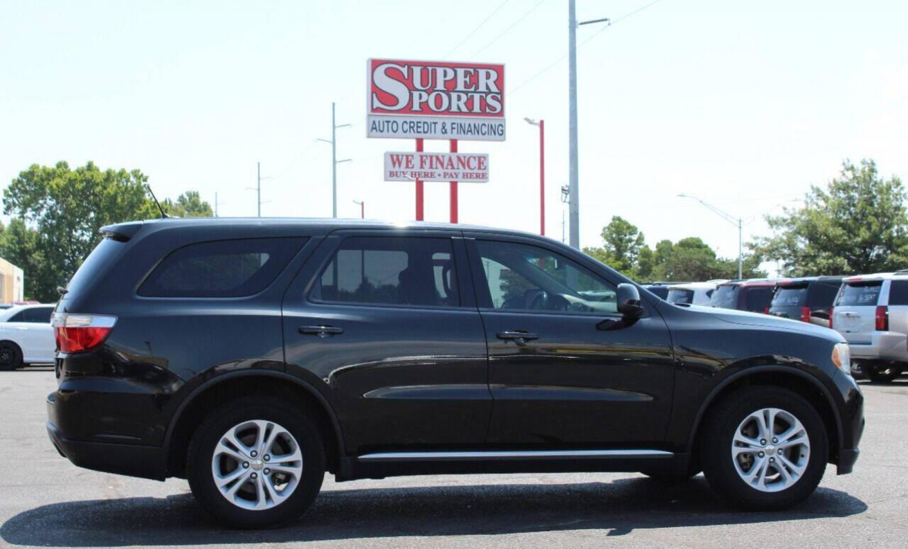 2013 Black Dodge Durango SXT RWD (1C4RDHAG7DC) with an 3.6L V6 DOHC 24V engine, 5-Speed Automatic transmission, located at 4301 NW 39th , Oklahoma City, OK, 73112, (405) 949-5600, 35.512135, -97.598671 - NO DRIVERS LICENCE NO-FULL COVERAGE INSURANCE-NO CREDIT CHECK. COME ON OVER TO SUPERSPORTS AND TAKE A LOOK AND TEST DRIVE PLEASE GIVE US A CALL AT (405) 949-5600. NO LICENSIA DE MANEJAR- NO SEGURO DE COBERTURA TOTAL- NO VERIFICACCION DE CREDITO. POR FAVOR VENGAN A SUPERSPORTS, E - Photo#21