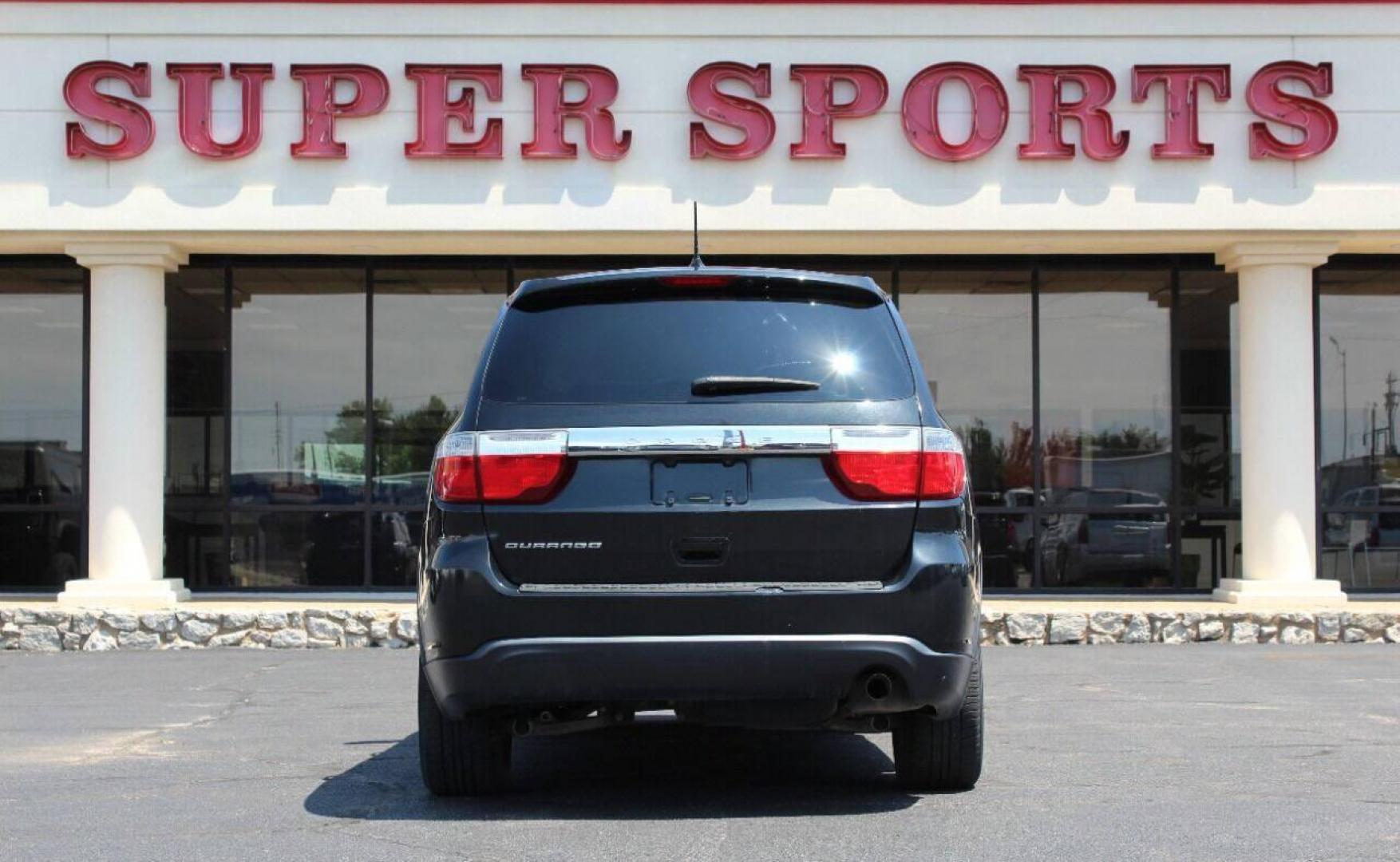 2013 Black Dodge Durango SXT RWD (1C4RDHAG7DC) with an 3.6L V6 DOHC 24V engine, 5-Speed Automatic transmission, located at 4301 NW 39th , Oklahoma City, OK, 73112, (405) 949-5600, 35.512135, -97.598671 - NO DRIVERS LICENCE NO-FULL COVERAGE INSURANCE-NO CREDIT CHECK. COME ON OVER TO SUPERSPORTS AND TAKE A LOOK AND TEST DRIVE PLEASE GIVE US A CALL AT (405) 949-5600. NO LICENSIA DE MANEJAR- NO SEGURO DE COBERTURA TOTAL- NO VERIFICACCION DE CREDITO. POR FAVOR VENGAN A SUPERSPORTS, E - Photo#22