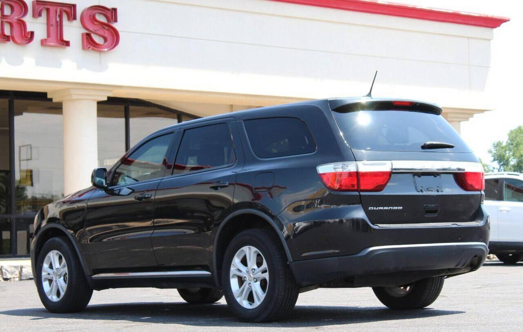 2013 Black Dodge Durango SXT RWD (1C4RDHAG7DC) with an 3.6L V6 DOHC 24V engine, 5-Speed Automatic transmission, located at 4301 NW 39th , Oklahoma City, OK, 73112, (405) 949-5600, 35.512135, -97.598671 - NO DRIVERS LICENCE NO-FULL COVERAGE INSURANCE-NO CREDIT CHECK. COME ON OVER TO SUPERSPORTS AND TAKE A LOOK AND TEST DRIVE PLEASE GIVE US A CALL AT (405) 949-5600. NO LICENSIA DE MANEJAR- NO SEGURO DE COBERTURA TOTAL- NO VERIFICACCION DE CREDITO. POR FAVOR VENGAN A SUPERSPORTS, E - Photo#23