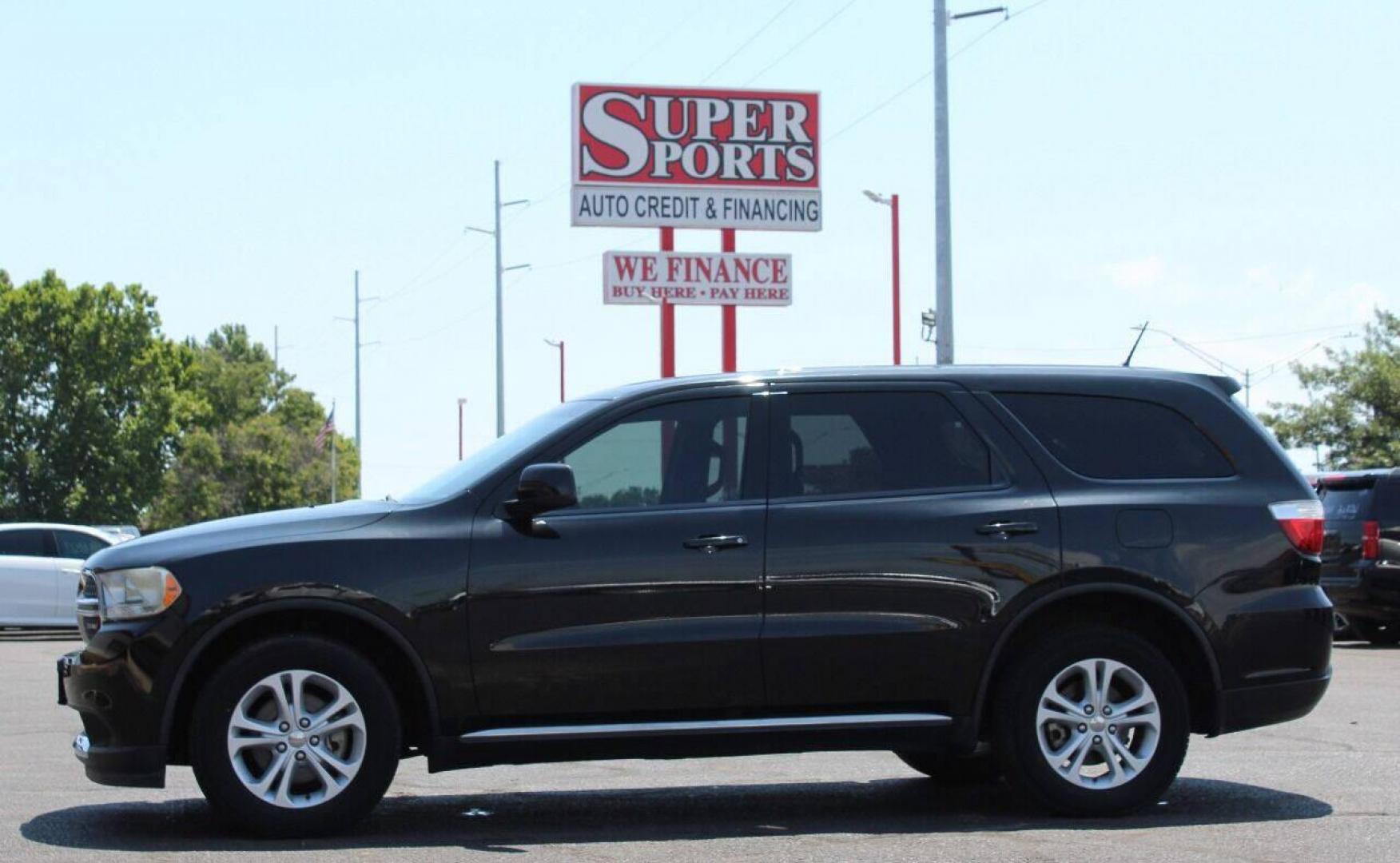 2013 Black Dodge Durango SXT RWD (1C4RDHAG7DC) with an 3.6L V6 DOHC 24V engine, 5-Speed Automatic transmission, located at 4301 NW 39th , Oklahoma City, OK, 73112, (405) 949-5600, 35.512135, -97.598671 - NO DRIVERS LICENCE NO-FULL COVERAGE INSURANCE-NO CREDIT CHECK. COME ON OVER TO SUPERSPORTS AND TAKE A LOOK AND TEST DRIVE PLEASE GIVE US A CALL AT (405) 949-5600. NO LICENSIA DE MANEJAR- NO SEGURO DE COBERTURA TOTAL- NO VERIFICACCION DE CREDITO. POR FAVOR VENGAN A SUPERSPORTS, E - Photo#24