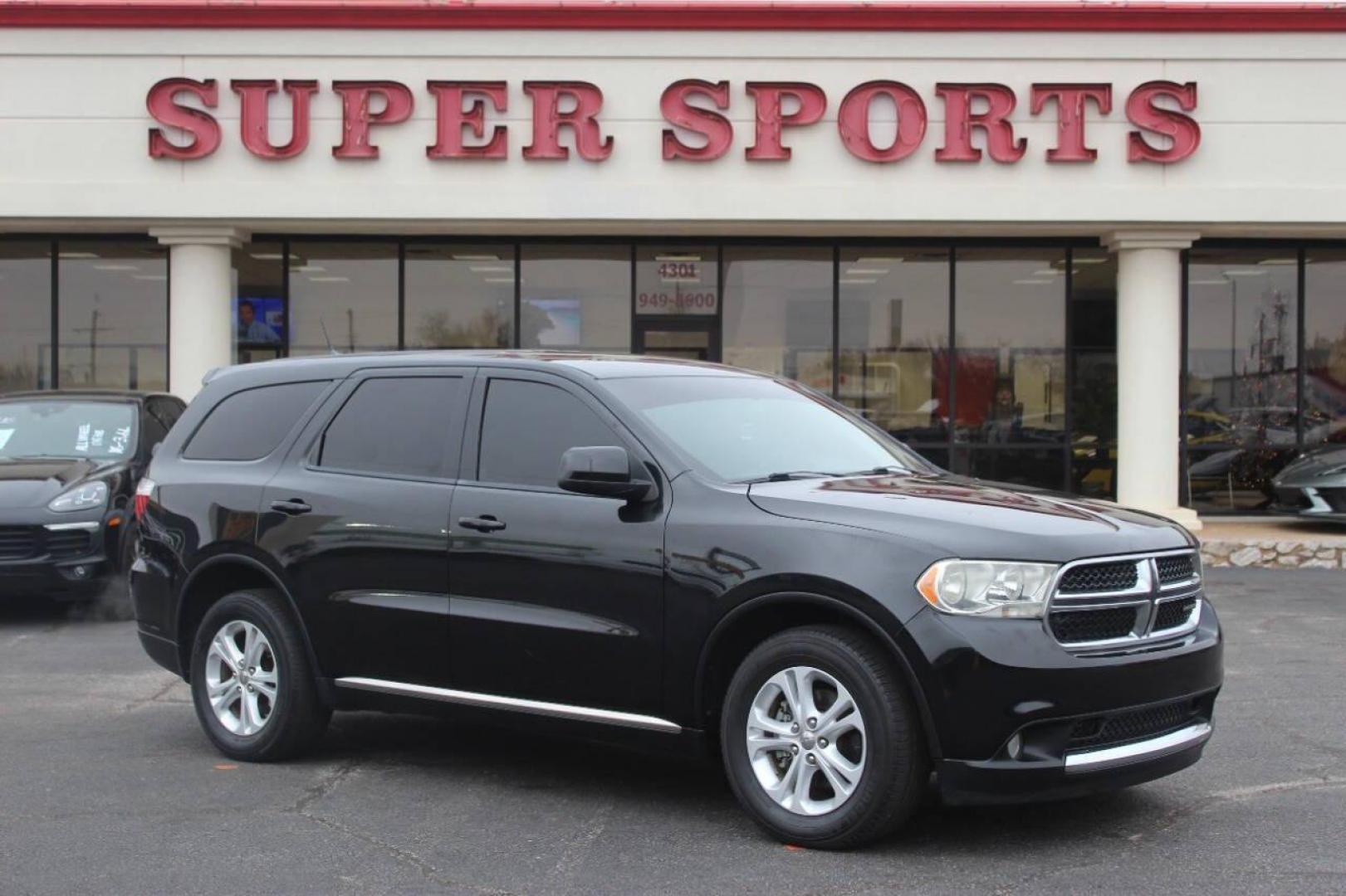 2013 Black Dodge Durango SXT RWD (1C4RDHAG7DC) with an 3.6L V6 DOHC 24V engine, 5-Speed Automatic transmission, located at 4301 NW 39th , Oklahoma City, OK, 73112, (405) 949-5600, 35.512135, -97.598671 - NO DRIVERS LICENCE NO-FULL COVERAGE INSURANCE-NO CREDIT CHECK. COME ON OVER TO SUPERSPORTS AND TAKE A LOOK AND TEST DRIVE PLEASE GIVE US A CALL AT (405) 949-5600. NO LICENSIA DE MANEJAR- NO SEGURO DE COBERTURA TOTAL- NO VERIFICACCION DE CREDITO. POR FAVOR VENGAN A SUPERSPORTS, E - Photo#0