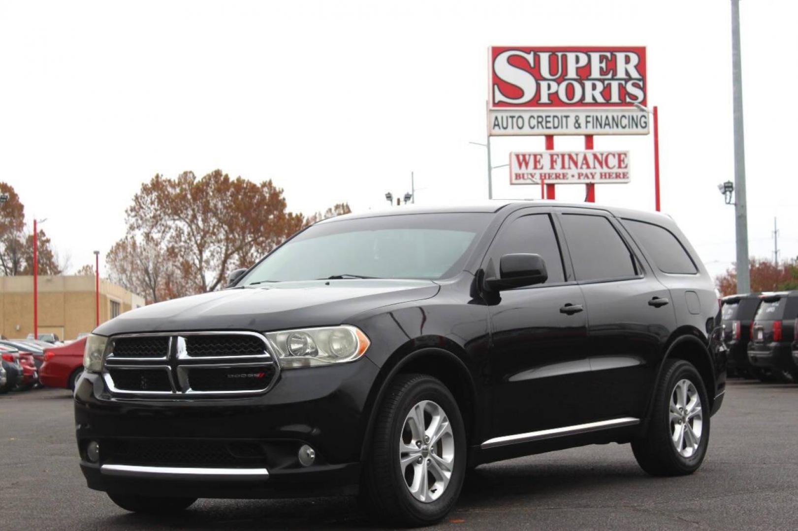 2013 Black Dodge Durango SXT RWD (1C4RDHAG7DC) with an 3.6L V6 DOHC 24V engine, 5-Speed Automatic transmission, located at 4301 NW 39th , Oklahoma City, OK, 73112, (405) 949-5600, 35.512135, -97.598671 - NO DRIVERS LICENCE NO-FULL COVERAGE INSURANCE-NO CREDIT CHECK. COME ON OVER TO SUPERSPORTS AND TAKE A LOOK AND TEST DRIVE PLEASE GIVE US A CALL AT (405) 949-5600. NO LICENSIA DE MANEJAR- NO SEGURO DE COBERTURA TOTAL- NO VERIFICACCION DE CREDITO. POR FAVOR VENGAN A SUPERSPORTS, E - Photo#5