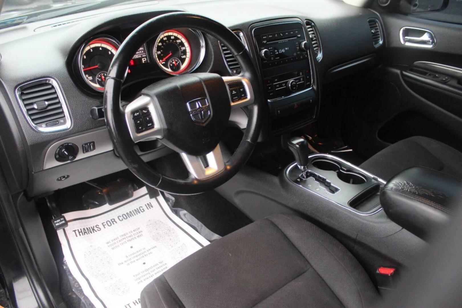 2013 Black Dodge Durango SXT RWD (1C4RDHAG7DC) with an 3.6L V6 DOHC 24V engine, 5-Speed Automatic transmission, located at 4301 NW 39th , Oklahoma City, OK, 73112, (405) 949-5600, 35.512135, -97.598671 - NO DRIVERS LICENCE NO-FULL COVERAGE INSURANCE-NO CREDIT CHECK. COME ON OVER TO SUPERSPORTS AND TAKE A LOOK AND TEST DRIVE PLEASE GIVE US A CALL AT (405) 949-5600. NO LICENSIA DE MANEJAR- NO SEGURO DE COBERTURA TOTAL- NO VERIFICACCION DE CREDITO. POR FAVOR VENGAN A SUPERSPORTS, E - Photo#15
