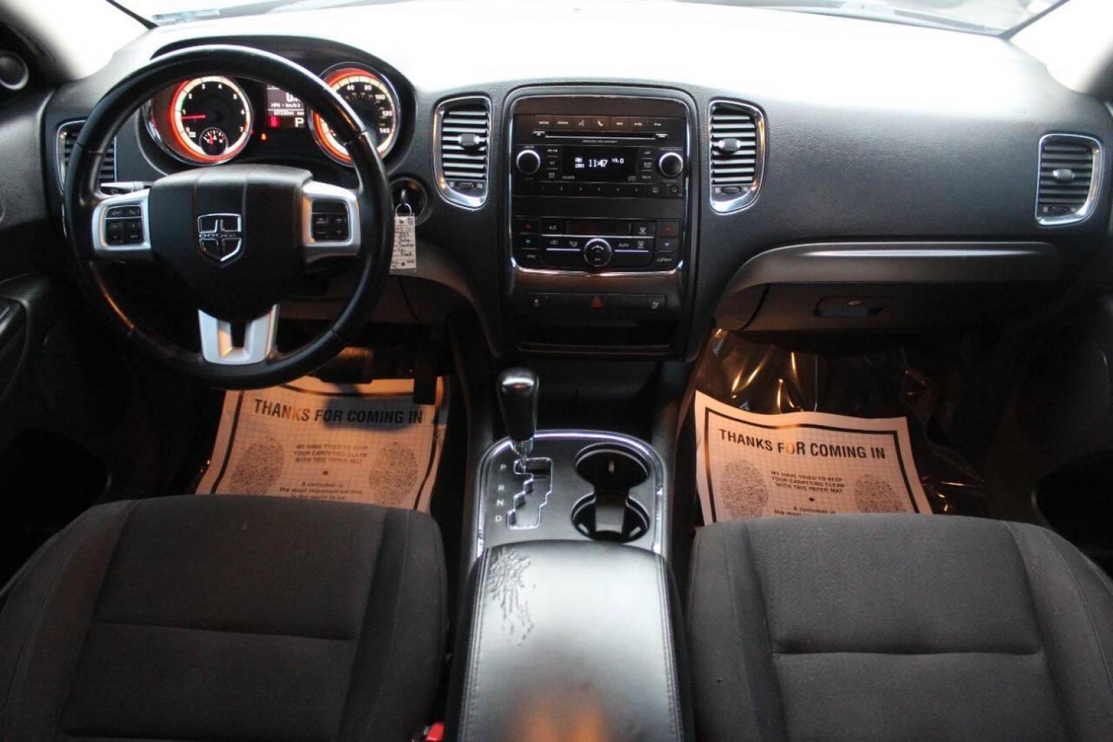2013 Black Dodge Durango SXT RWD (1C4RDHAG7DC) with an 3.6L V6 DOHC 24V engine, 5-Speed Automatic transmission, located at 4301 NW 39th , Oklahoma City, OK, 73112, (405) 949-5600, 35.512135, -97.598671 - NO DRIVERS LICENCE NO-FULL COVERAGE INSURANCE-NO CREDIT CHECK. COME ON OVER TO SUPERSPORTS AND TAKE A LOOK AND TEST DRIVE PLEASE GIVE US A CALL AT (405) 949-5600. NO LICENSIA DE MANEJAR- NO SEGURO DE COBERTURA TOTAL- NO VERIFICACCION DE CREDITO. POR FAVOR VENGAN A SUPERSPORTS, E - Photo#17