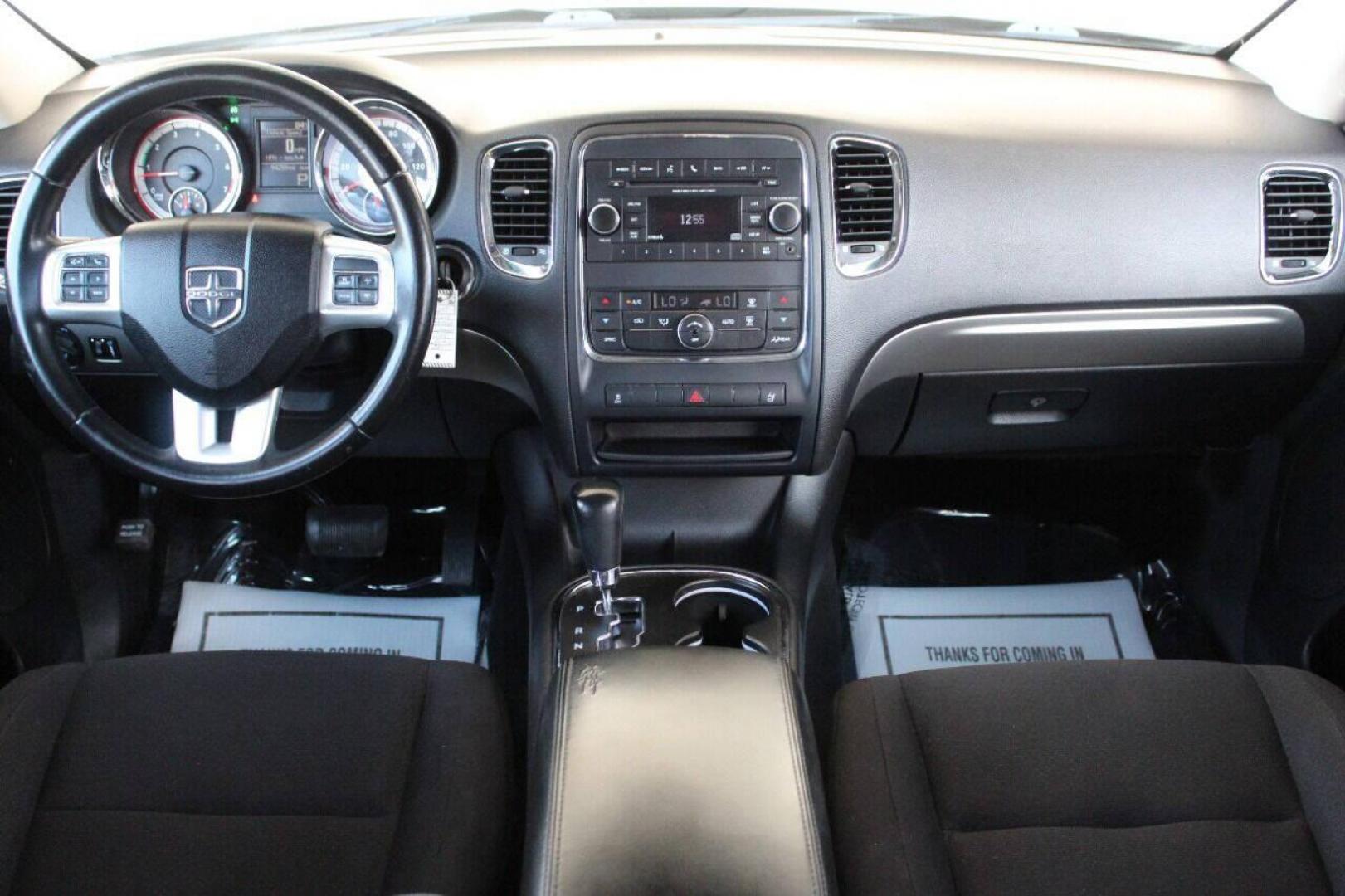 2013 Black Dodge Durango SXT RWD (1C4RDHAG7DC) with an 3.6L V6 DOHC 24V engine, 5-Speed Automatic transmission, located at 4301 NW 39th , Oklahoma City, OK, 73112, (405) 949-5600, 35.512135, -97.598671 - NO DRIVERS LICENCE NO-FULL COVERAGE INSURANCE-NO CREDIT CHECK. COME ON OVER TO SUPERSPORTS AND TAKE A LOOK AND TEST DRIVE PLEASE GIVE US A CALL AT (405) 949-5600. NO LICENSIA DE MANEJAR- NO SEGURO DE COBERTURA TOTAL- NO VERIFICACCION DE CREDITO. POR FAVOR VENGAN A SUPERSPORTS, E - Photo#37