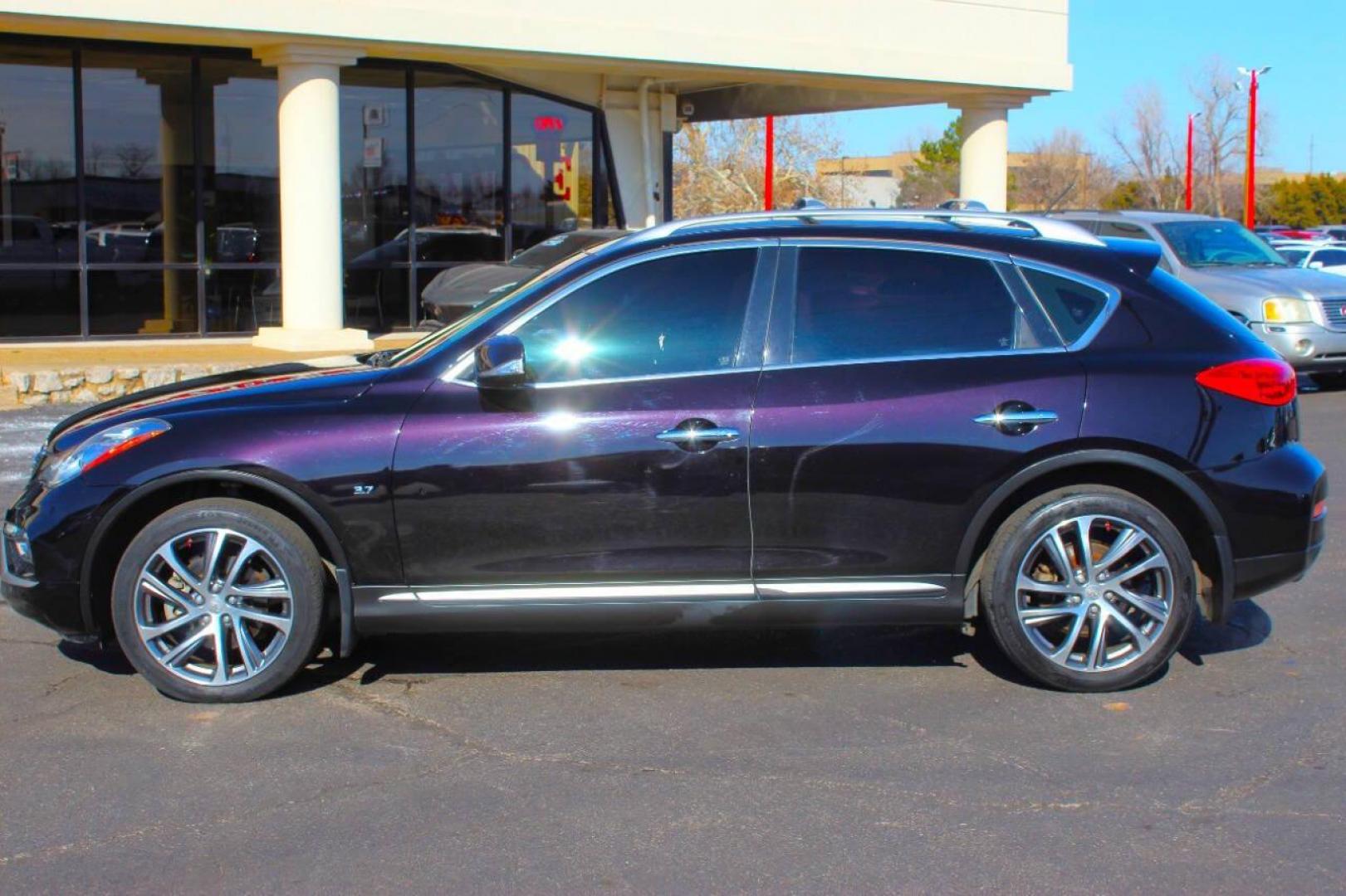 2016 Purple Infiniti QX50 Base AWD (JN1BJ0RR7GM) with an 3.7L V6 DOHC 24V engine, 7A transmission, located at 4301 NW 39th , Oklahoma City, OK, 73112, (405) 949-5600, 35.512135, -97.598671 - NO DRIVERS LICENCE NO-FULL COVERAGE INSURANCE-NO CREDIT CHECK. COME ON OVER TO SUPERSPORTS AND TAKE A LOOK AND TEST DRIVE. PLEASE GIVE US A CALL AT (405) 949-5600 . NO LICENSIA DE MANEJAR- NO SEGURO DE COBERTURA TOTAL- NO VERIFICACCION DE CREDITO. POR FAVOR VENGAN A SUPERSPORTS, ECHE UN - Photo#6