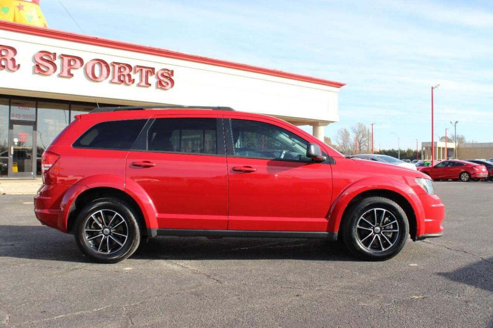 2018 Red Dodge Journey SE (3C4PDCAB3JT) with an 2.4L L4 DOHC 16V engine, 4A transmission, located at 4301 NW 39th , Oklahoma City, OK, 73112, (405) 949-5600, 35.512135, -97.598671 - NO DRIVERS LICENCE -NO FULL COVERAGE INSURANCE - NO CREDIT CHECK. COME ON OVER TO SUPERSPORTS, TAKE A LOOK AND TEST DRIVE. PLEASE GIVE US A CALL AT (405) 949-5600. NO LICENCIA DE CONDUCIR - NO SEGURO DE COBERTURA TOTAL - NO VERIFICACION DE CREDITO. VISITENOS EN SUPERSPORTS, MIRE NUESTRO - Photo#2