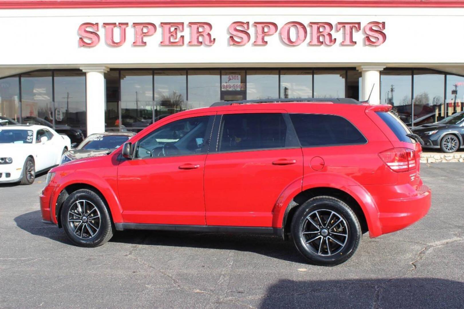 2018 Red Dodge Journey SE (3C4PDCAB3JT) with an 2.4L L4 DOHC 16V engine, 4A transmission, located at 4301 NW 39th , Oklahoma City, OK, 73112, (405) 949-5600, 35.512135, -97.598671 - NO DRIVERS LICENCE -NO FULL COVERAGE INSURANCE - NO CREDIT CHECK. COME ON OVER TO SUPERSPORTS, TAKE A LOOK AND TEST DRIVE. PLEASE GIVE US A CALL AT (405) 949-5600. NO LICENCIA DE CONDUCIR - NO SEGURO DE COBERTURA TOTAL - NO VERIFICACION DE CREDITO. VISITENOS EN SUPERSPORTS, MIRE NUESTRO - Photo#4