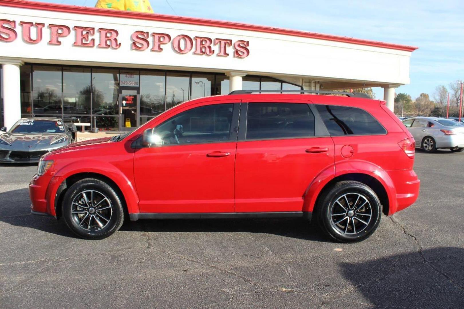 2018 Red Dodge Journey SE (3C4PDCAB3JT) with an 2.4L L4 DOHC 16V engine, 4A transmission, located at 4301 NW 39th , Oklahoma City, OK, 73112, (405) 949-5600, 35.512135, -97.598671 - NO DRIVERS LICENCE -NO FULL COVERAGE INSURANCE - NO CREDIT CHECK. COME ON OVER TO SUPERSPORTS, TAKE A LOOK AND TEST DRIVE. PLEASE GIVE US A CALL AT (405) 949-5600. NO LICENCIA DE CONDUCIR - NO SEGURO DE COBERTURA TOTAL - NO VERIFICACION DE CREDITO. VISITENOS EN SUPERSPORTS, MIRE NUESTRO - Photo#5