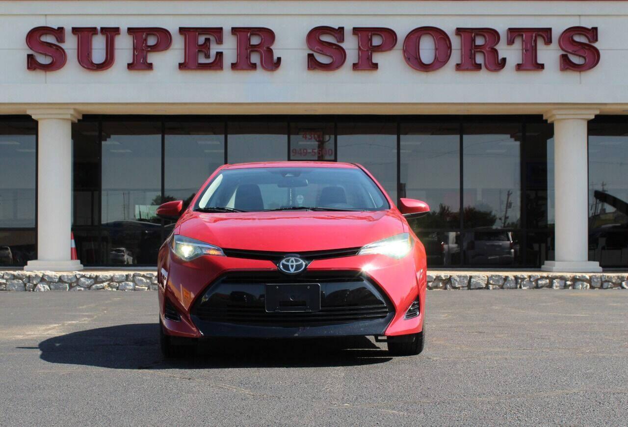 2018 Red Toyota Corolla XLE CVT (2T1BURHE7JC) with an 1.8L L4 DOHC 16V engine, CVT transmission, located at 4301 NW 39th , Oklahoma City, OK, 73112, (405) 949-5600, 35.512135, -97.598671 - NO DRIVERS LICENCE -NO FULL COVERAGE INSURANCE - NO CREDIT CHECK. COME ON OVER TO SUPERSPORTS, TAKE A LOOK AND TEST DRIVE. PLEASE GIVE US A CALL AT (405) 949-5600. NO LICENCIA DE CONDUCIR - NO SEGURO DE COBERTURA TOTAL - NO VERIFICACION DE CREDITO. VISITENOS EN SUPERSPORTS, MIRE NUESTRO - Photo#2