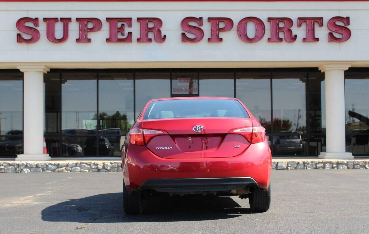 2018 Red Toyota Corolla XLE CVT (2T1BURHE7JC) with an 1.8L L4 DOHC 16V engine, CVT transmission, located at 4301 NW 39th , Oklahoma City, OK, 73112, (405) 949-5600, 35.512135, -97.598671 - NO DRIVERS LICENCE -NO FULL COVERAGE INSURANCE - NO CREDIT CHECK. COME ON OVER TO SUPERSPORTS, TAKE A LOOK AND TEST DRIVE. PLEASE GIVE US A CALL AT (405) 949-5600. NO LICENCIA DE CONDUCIR - NO SEGURO DE COBERTURA TOTAL - NO VERIFICACION DE CREDITO. VISITENOS EN SUPERSPORTS, MIRE NUESTRO - Photo#4