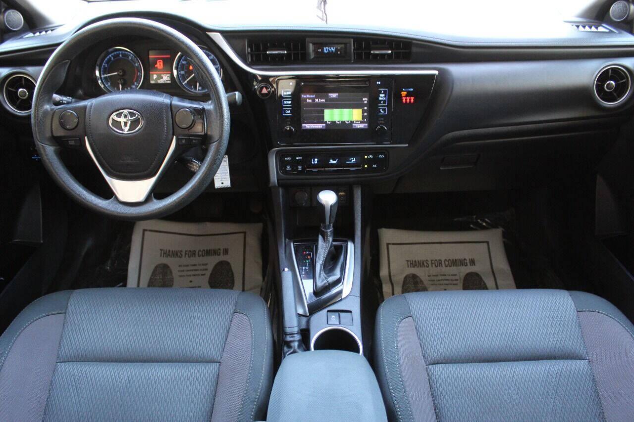 2018 Red Toyota Corolla XLE CVT (2T1BURHE7JC) with an 1.8L L4 DOHC 16V engine, CVT transmission, located at 4301 NW 39th , Oklahoma City, OK, 73112, (405) 949-5600, 35.512135, -97.598671 - NO DRIVERS LICENCE -NO FULL COVERAGE INSURANCE - NO CREDIT CHECK. COME ON OVER TO SUPERSPORTS, TAKE A LOOK AND TEST DRIVE. PLEASE GIVE US A CALL AT (405) 949-5600. NO LICENCIA DE CONDUCIR - NO SEGURO DE COBERTURA TOTAL - NO VERIFICACION DE CREDITO. VISITENOS EN SUPERSPORTS, MIRE NUESTRO - Photo#16