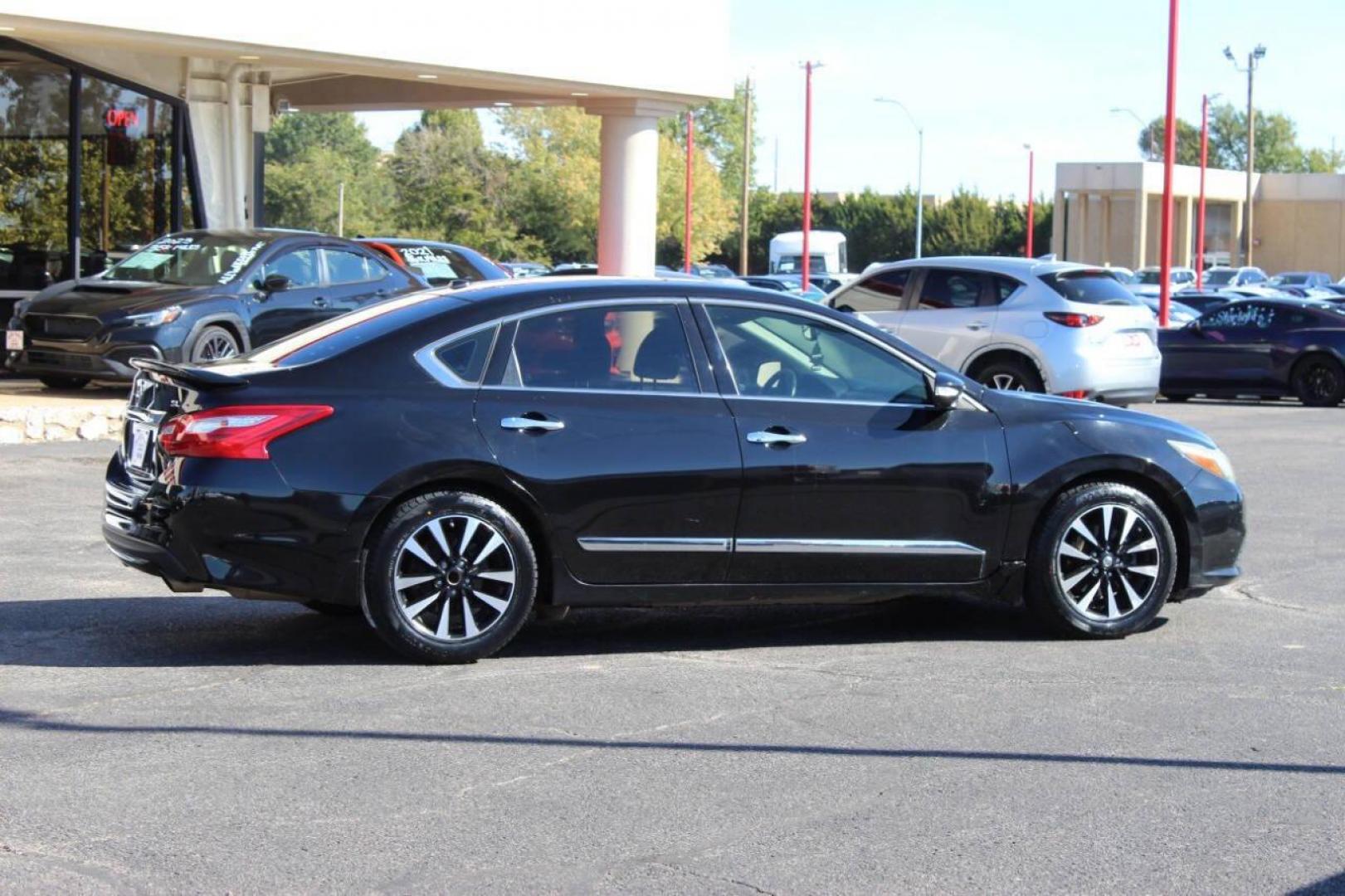 2017 Black Nissan Altima 2.5 S (1N4AL3AP9HC) with an 2.5L L4 DOHC 16V engine, CVT transmission, located at 4301 NW 39th , Oklahoma City, OK, 73112, (405) 949-5600, 35.512135, -97.598671 - 4 new tiers. NO DRIVERS LICENCE -NO FULL COVERAGE INSURANCE - NO CREDIT CHECK. COME ON OVER TO SUPERSPORTS, TAKE A LOOK AND TEST DRIVE. PLEASE GIVE US A CALL AT (405) 949-5600. NO LICENCIA DE CONDUCIR - NO SEGURO DE COBERTURA TOTAL - NO VERIFICACION DE CREDITO. VISITENOS EN SUPERS - Photo#2