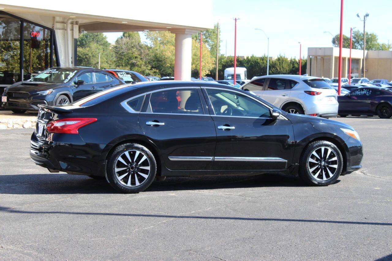 2017 Black Nissan Altima 2.5 S (1N4AL3AP9HC) with an 2.5L L4 DOHC 16V engine, CVT transmission, located at 4301 NW 39th , Oklahoma City, OK, 73112, (405) 949-5600, 35.512135, -97.598671 - Photo#2