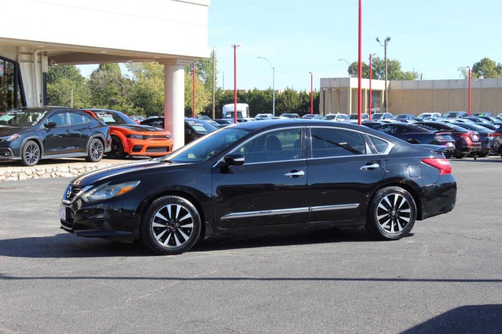 2017 Black Nissan Altima 2.5 S (1N4AL3AP9HC) with an 2.5L L4 DOHC 16V engine, CVT transmission, located at 4301 NW 39th , Oklahoma City, OK, 73112, (405) 949-5600, 35.512135, -97.598671 - 4 new tiers. NO DRIVERS LICENCE -NO FULL COVERAGE INSURANCE - NO CREDIT CHECK. COME ON OVER TO SUPERSPORTS, TAKE A LOOK AND TEST DRIVE. PLEASE GIVE US A CALL AT (405) 949-5600. NO LICENCIA DE CONDUCIR - NO SEGURO DE COBERTURA TOTAL - NO VERIFICACION DE CREDITO. VISITENOS EN SUPERS - Photo#5